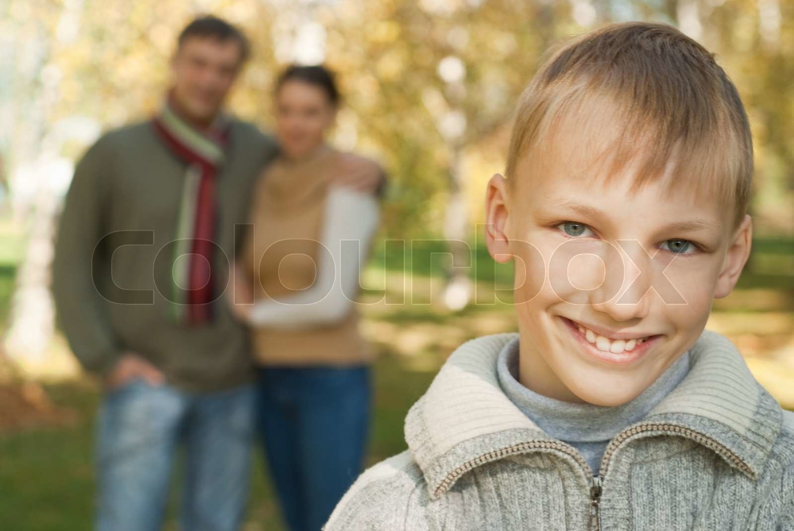 glückliche Familie mit drei Stock Bild Colourbox