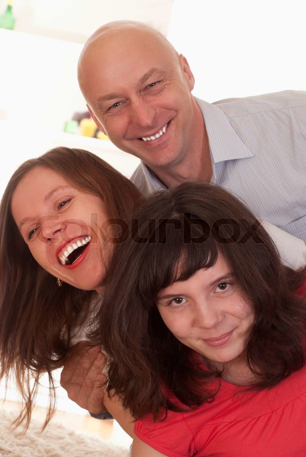 glückliche Familie mit drei Stock Bild Colourbox