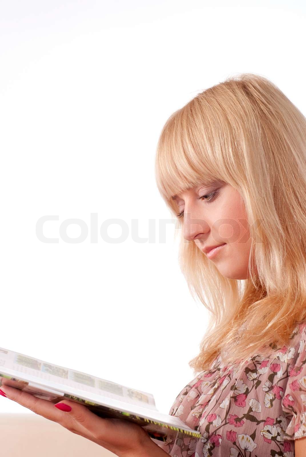 cute blonde reading | Stock image | Colourbox