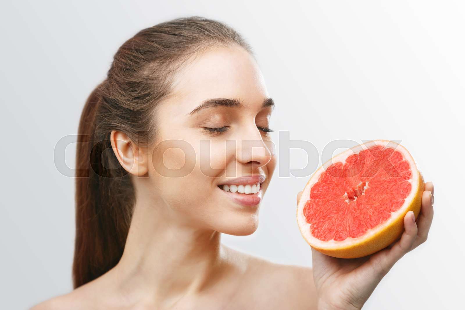 Woman with Grapefruit Stock image Colourbox