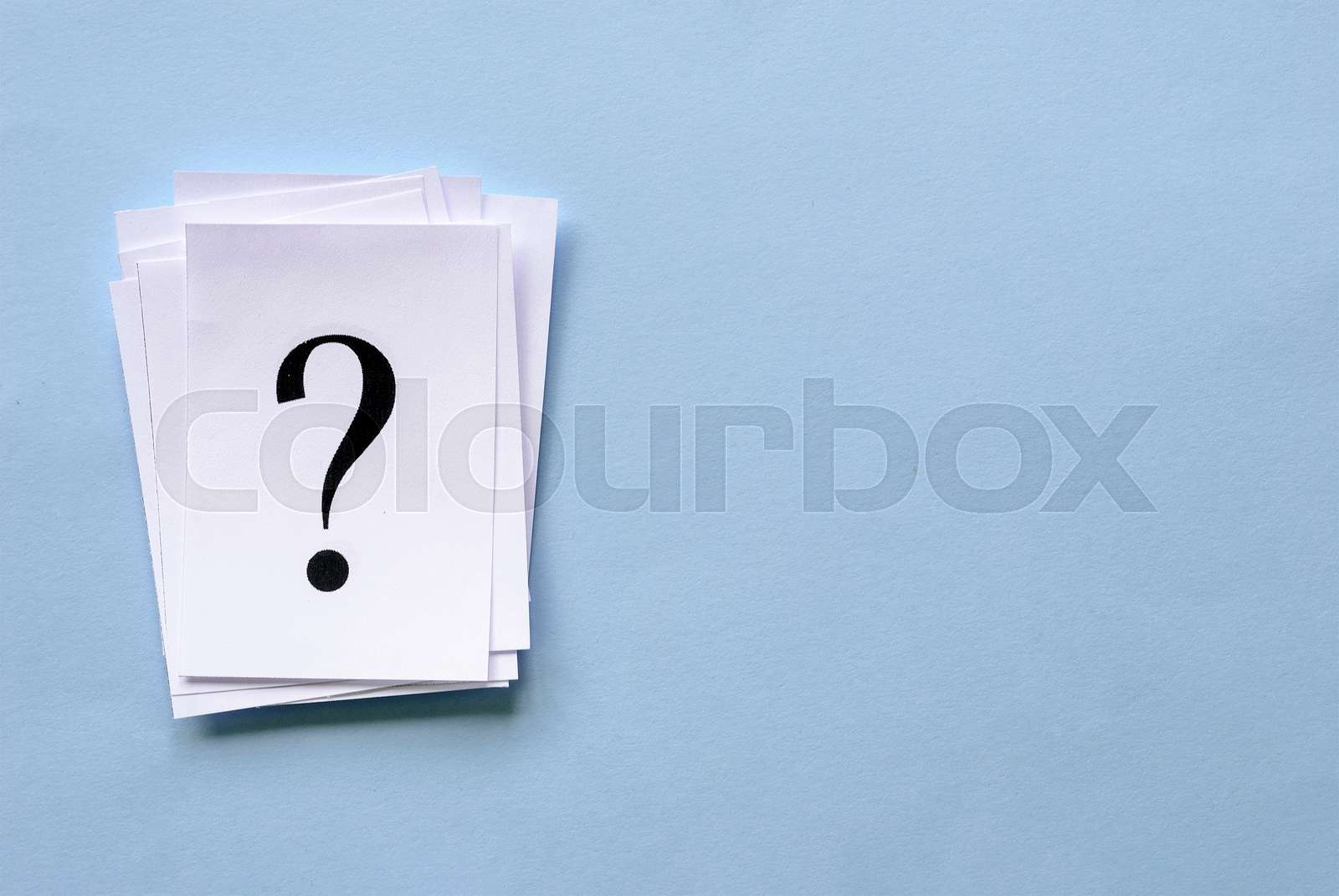 Pile of stacked question marks on white paper Stock image Colourbox