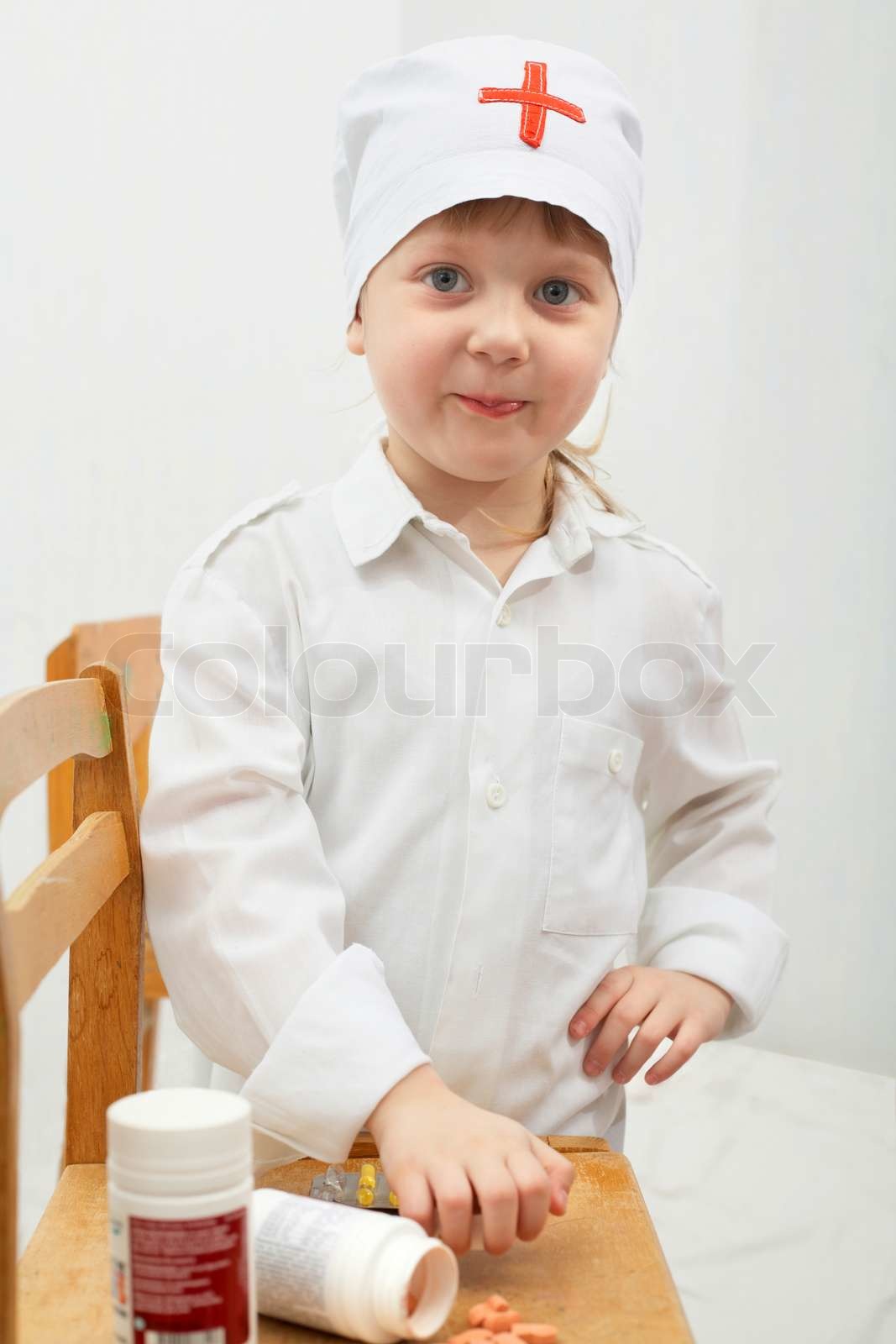 Girl in white clothes Stock image Colourbox