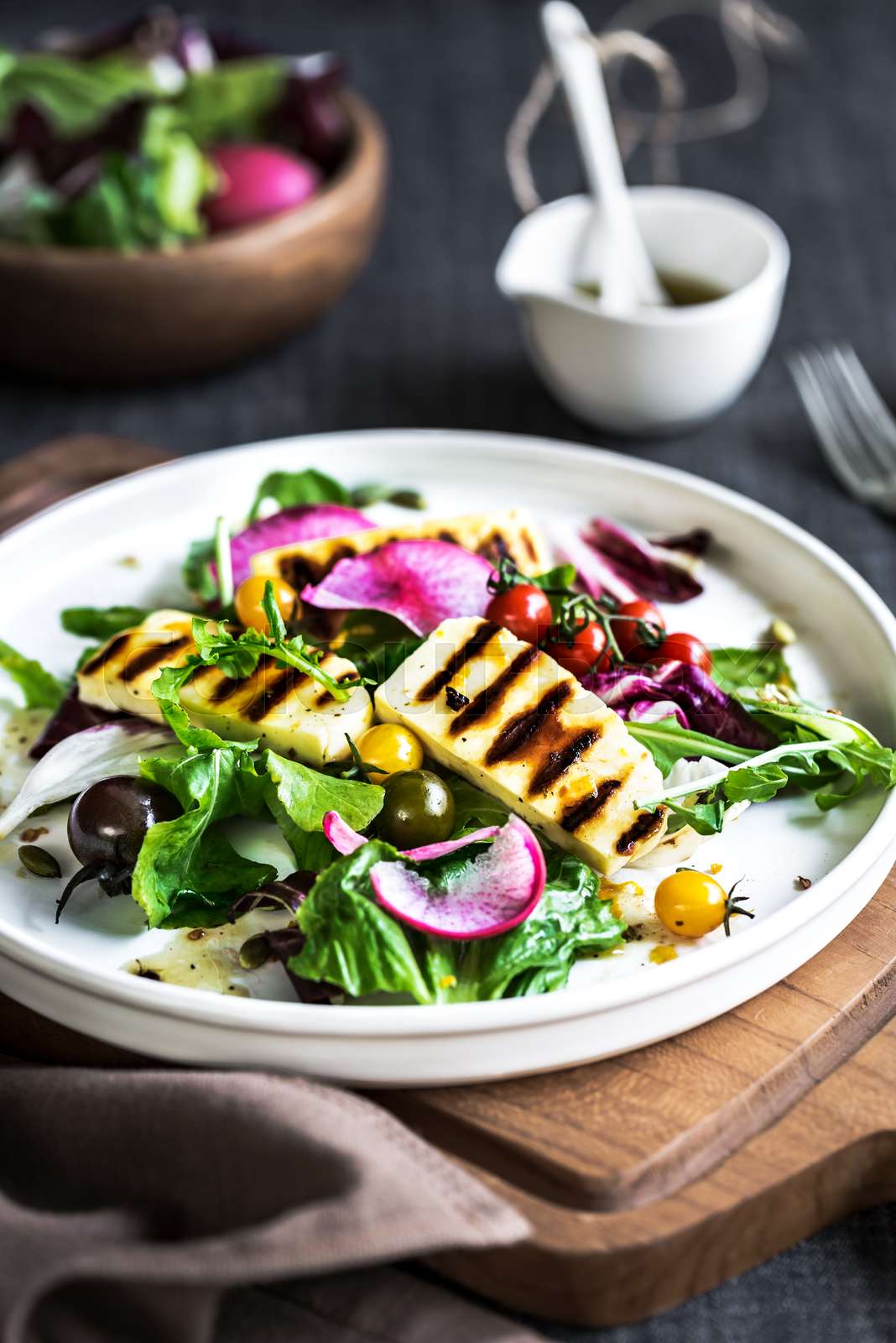 Grilled Halloumi cheese with fresh Salad Stock image Colourbox