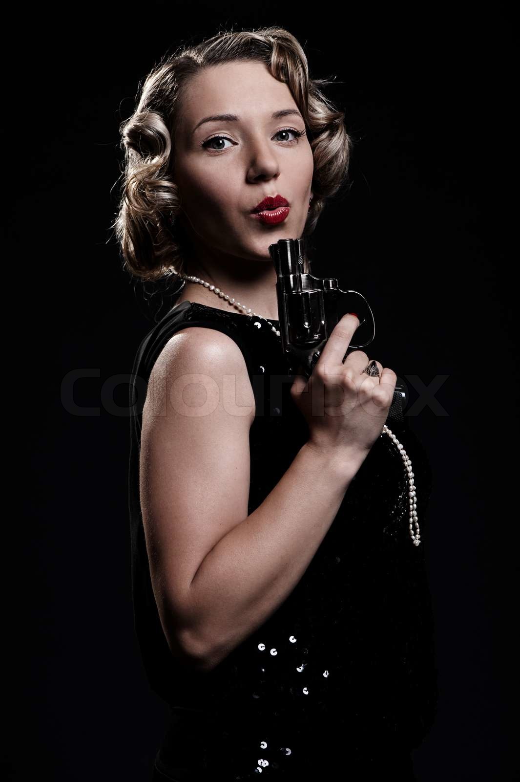 woman with gun | Stock image | Colourbox