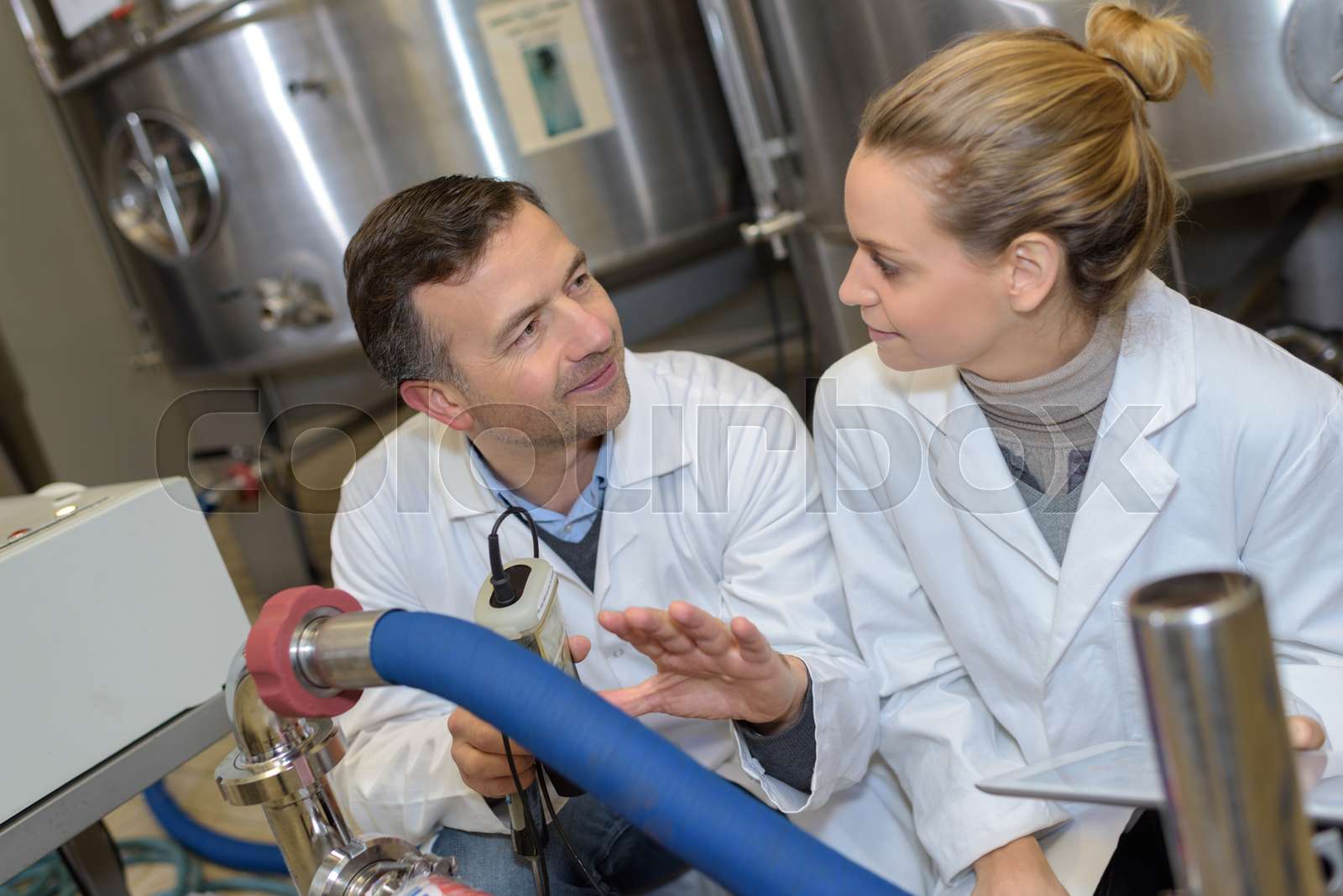 experts making tests in winery laboratory | Stock image | Colourbox