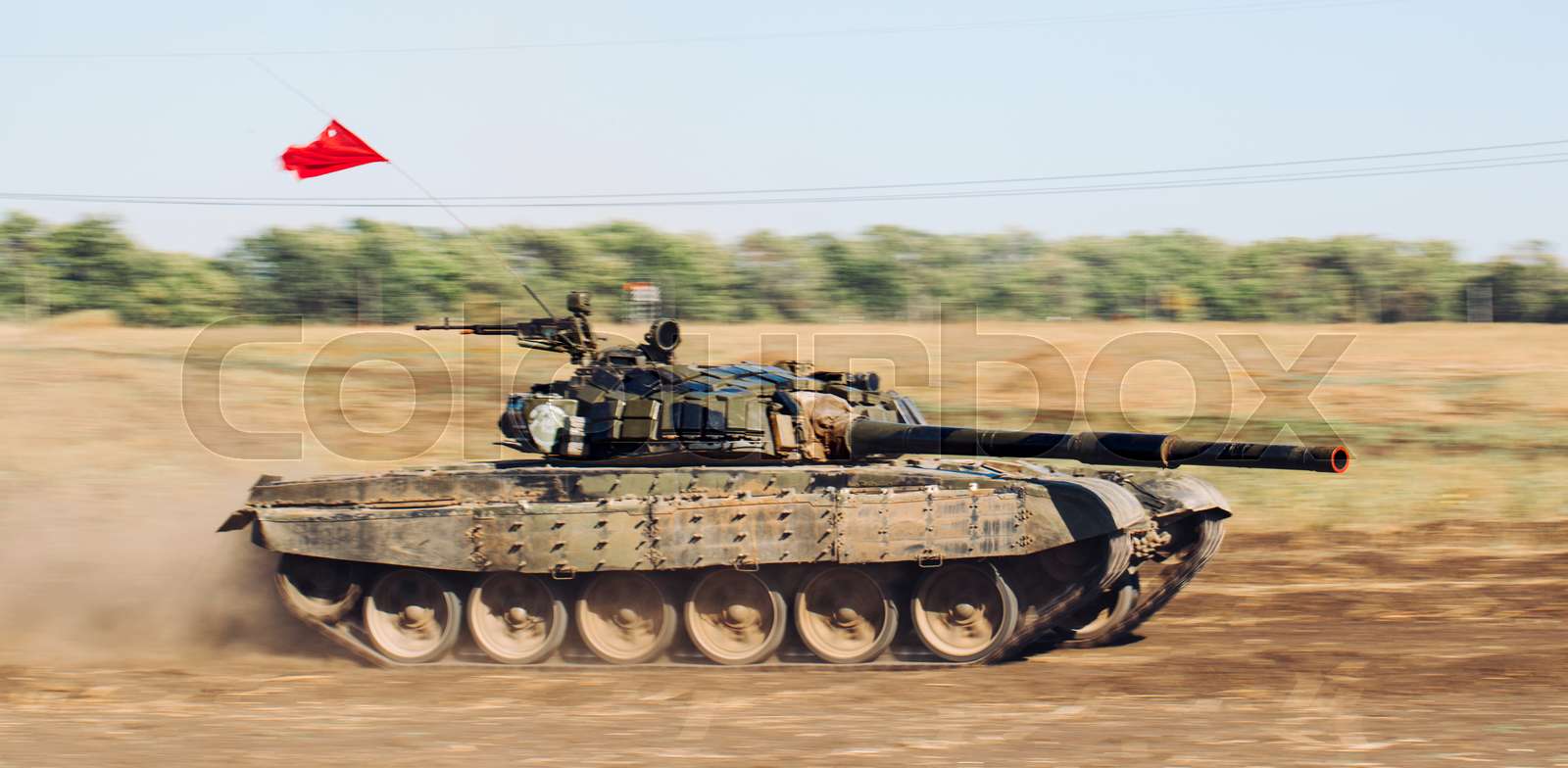 Armored Tank rides on offroad. Tank exercises in the countryside