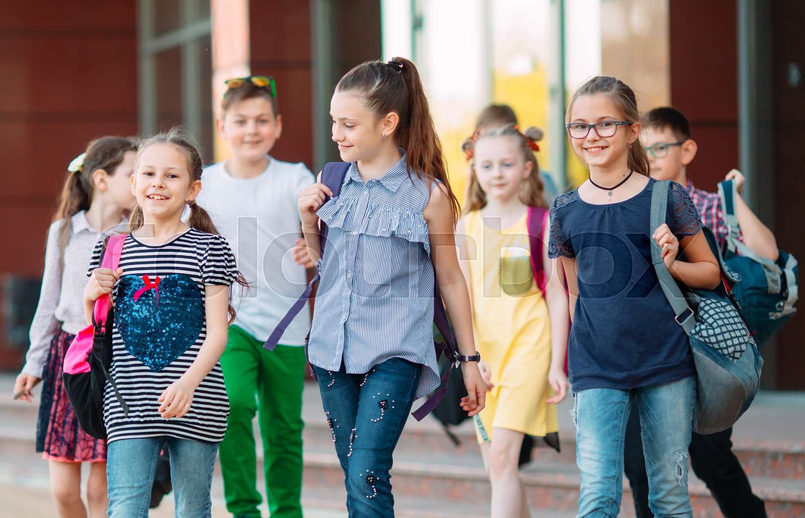 group-of-kids-going-to-school-together-stock-image-colourbox