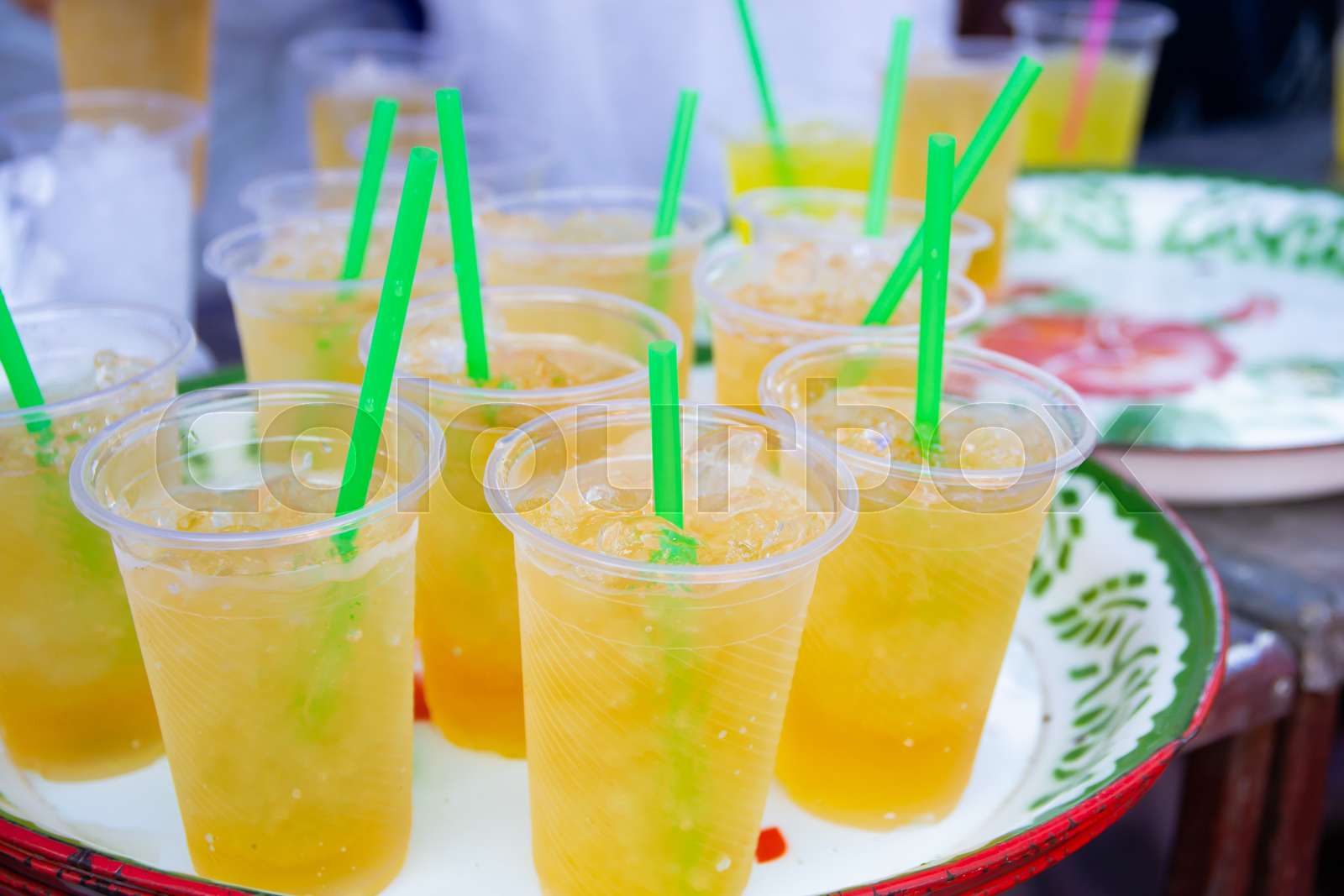 Colorful soft drink in plastic cup Stock image Colourbox