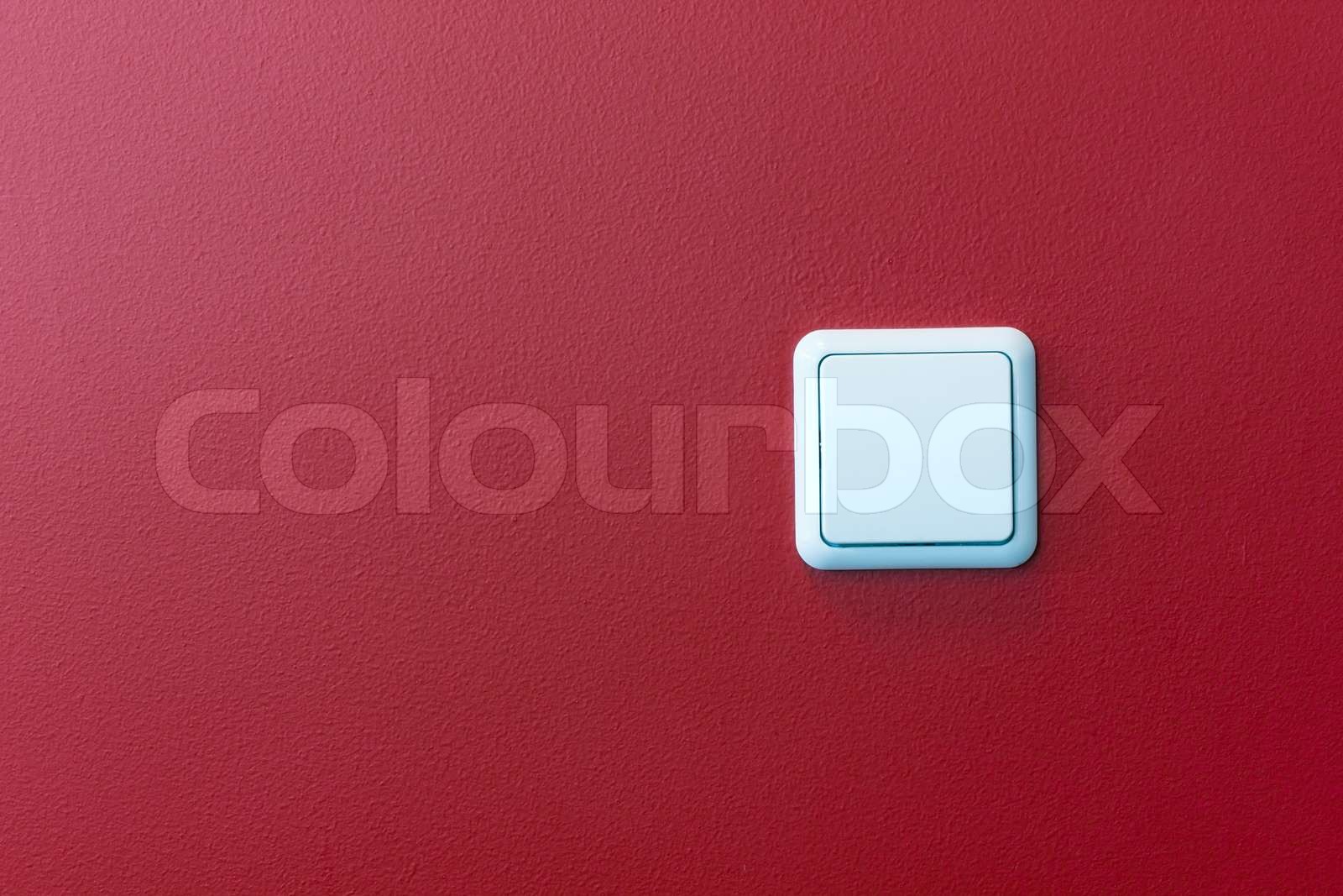 plastic light switch in theredwall Stock image Colourbox