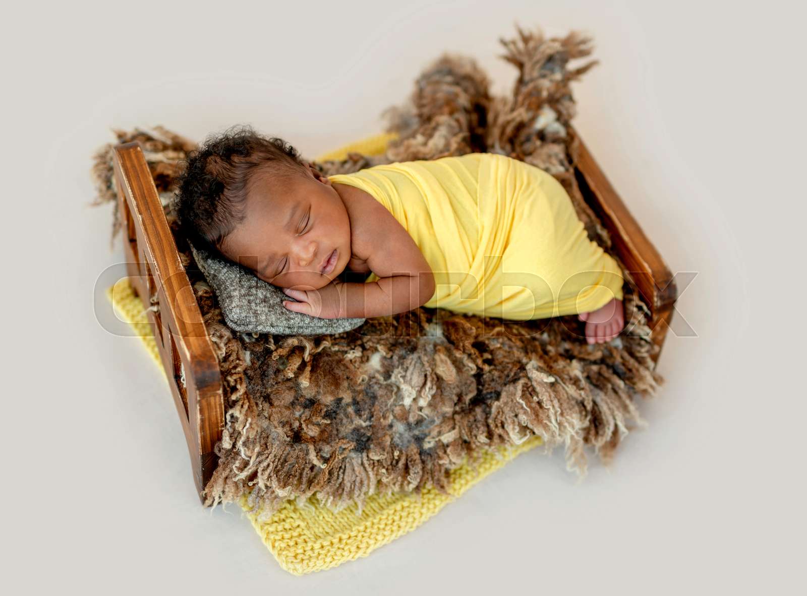 Newborn sleeping in cradle Stock image Colourbox