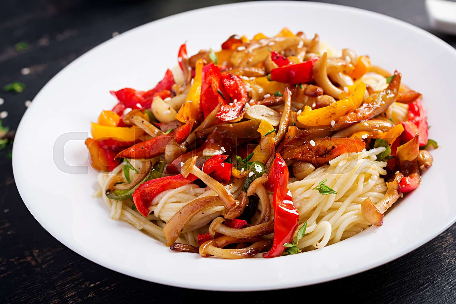 Noodles with shimeji mushrooms and paprika. Oriental meal. Japanese
