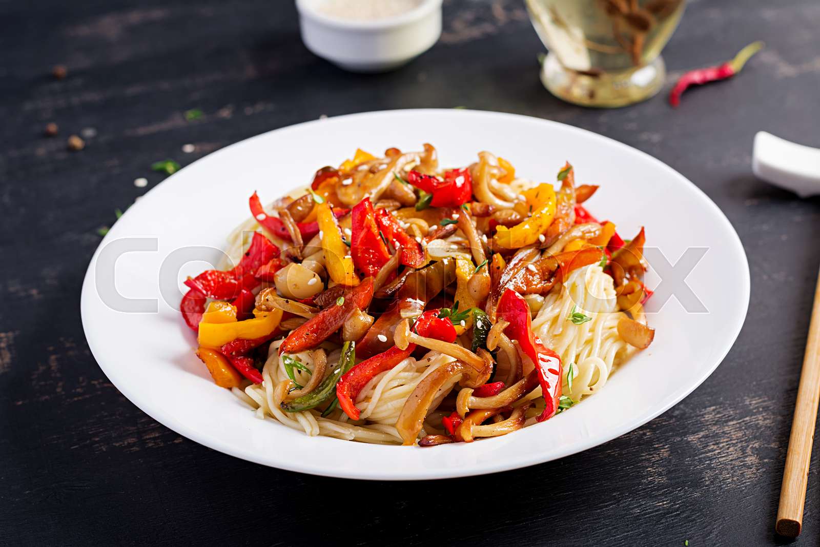 Noodles with shimeji mushrooms and paprika. Oriental meal. Japanese