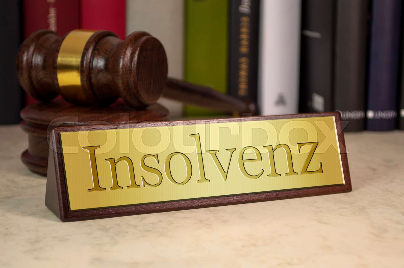 Golden Sign With Gavel And The German Word For Insolvency Insolvenz
