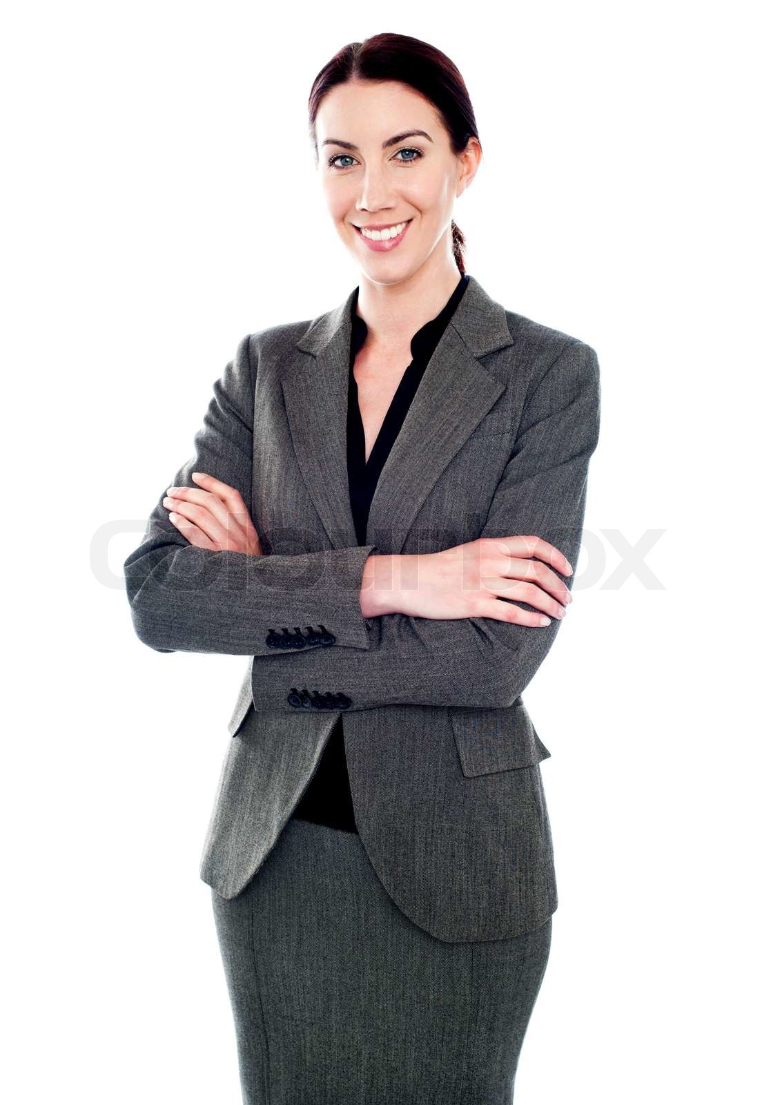Corporate Dame stehend mit ihre Arme verschränkt Stock Bild Colourbox