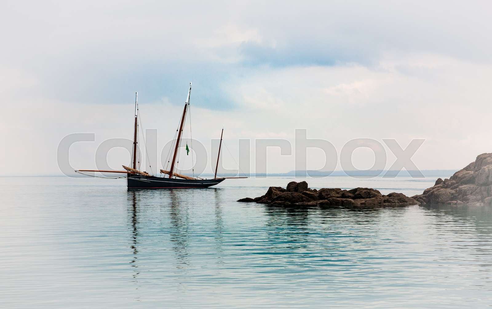 Sailing boat in the clear water | Stock image | Colourbox
