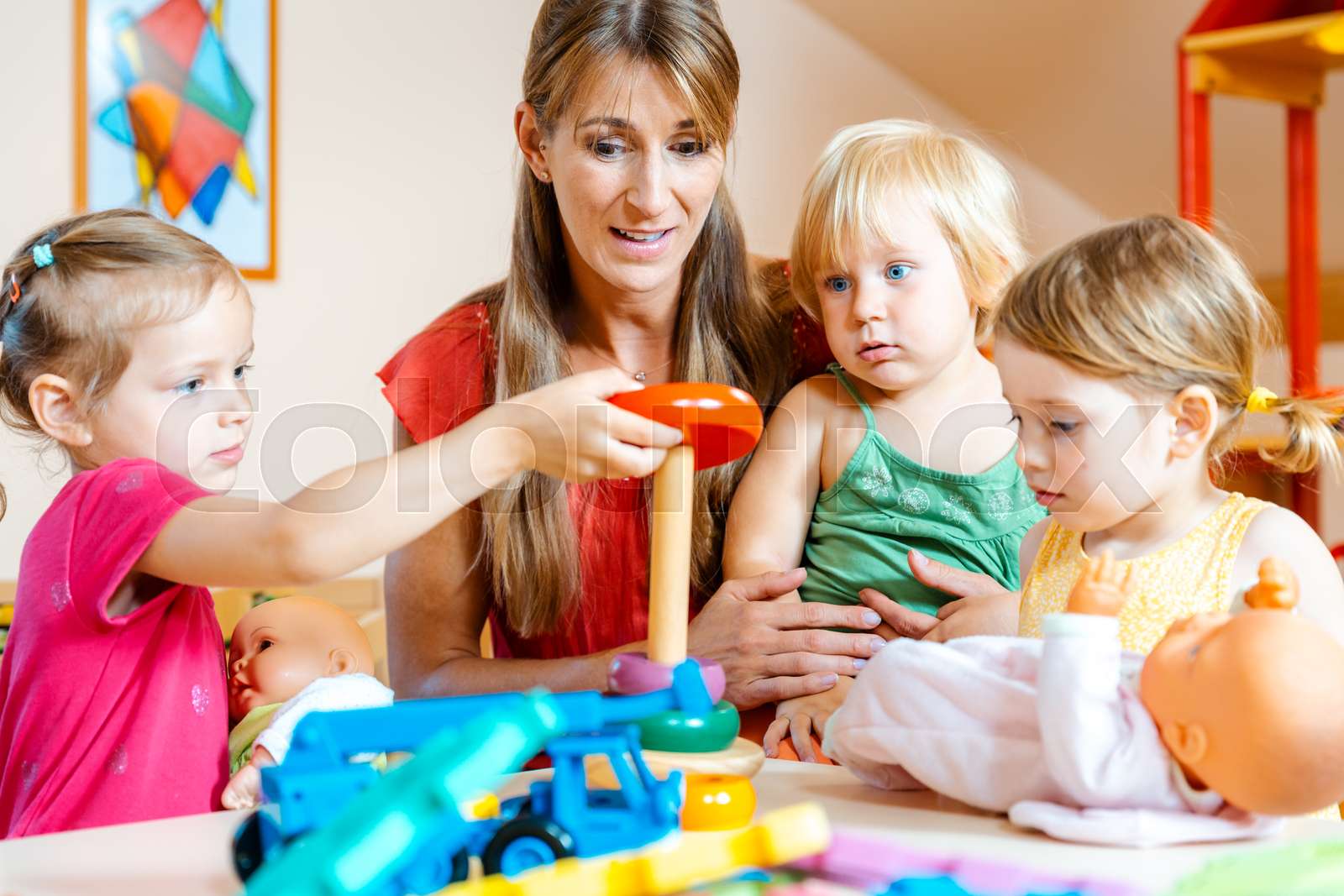 Children in nursery school learning and playing | Stock image | Colourbox