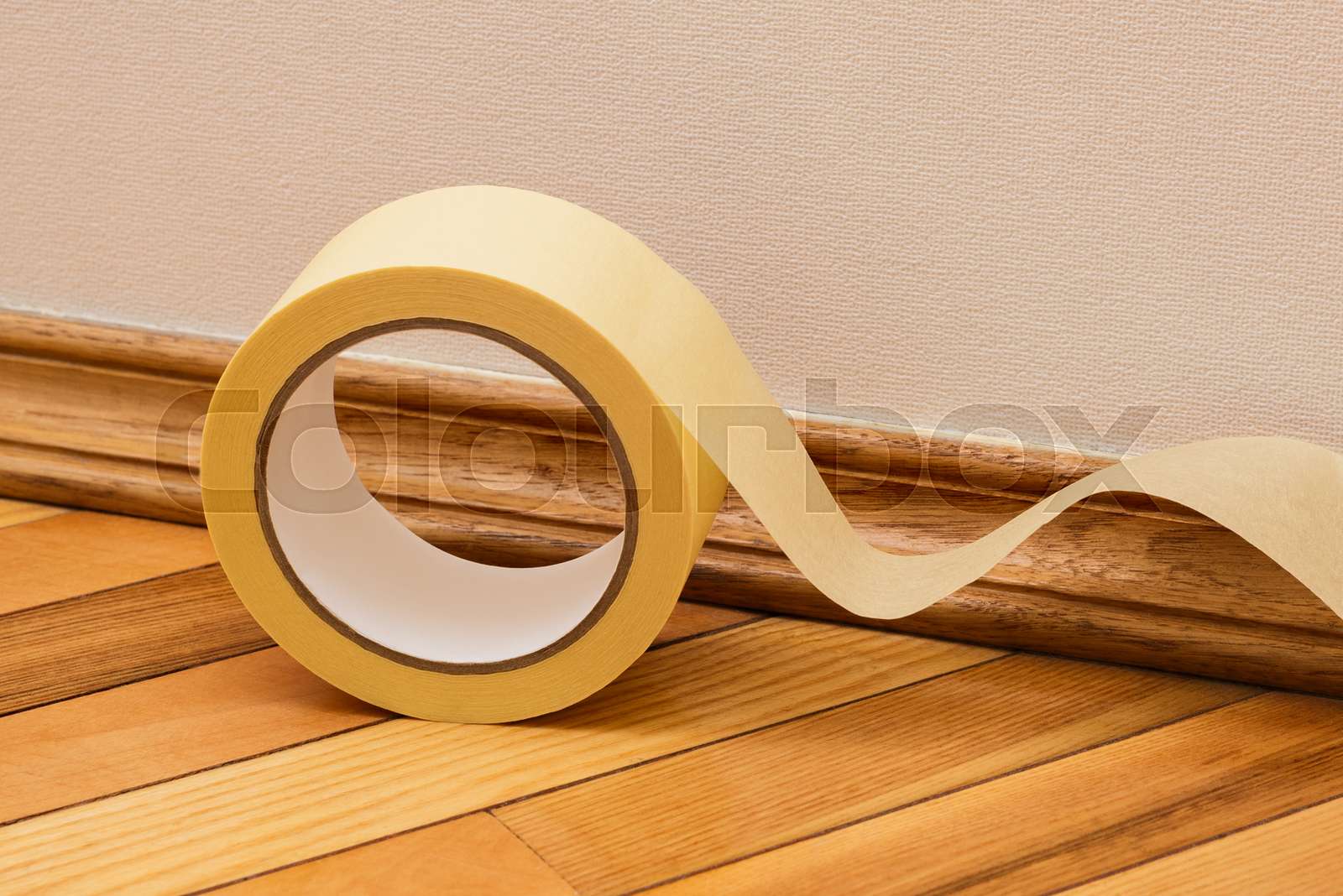 Masking tape to mask the skirting board Stock image Colourbox