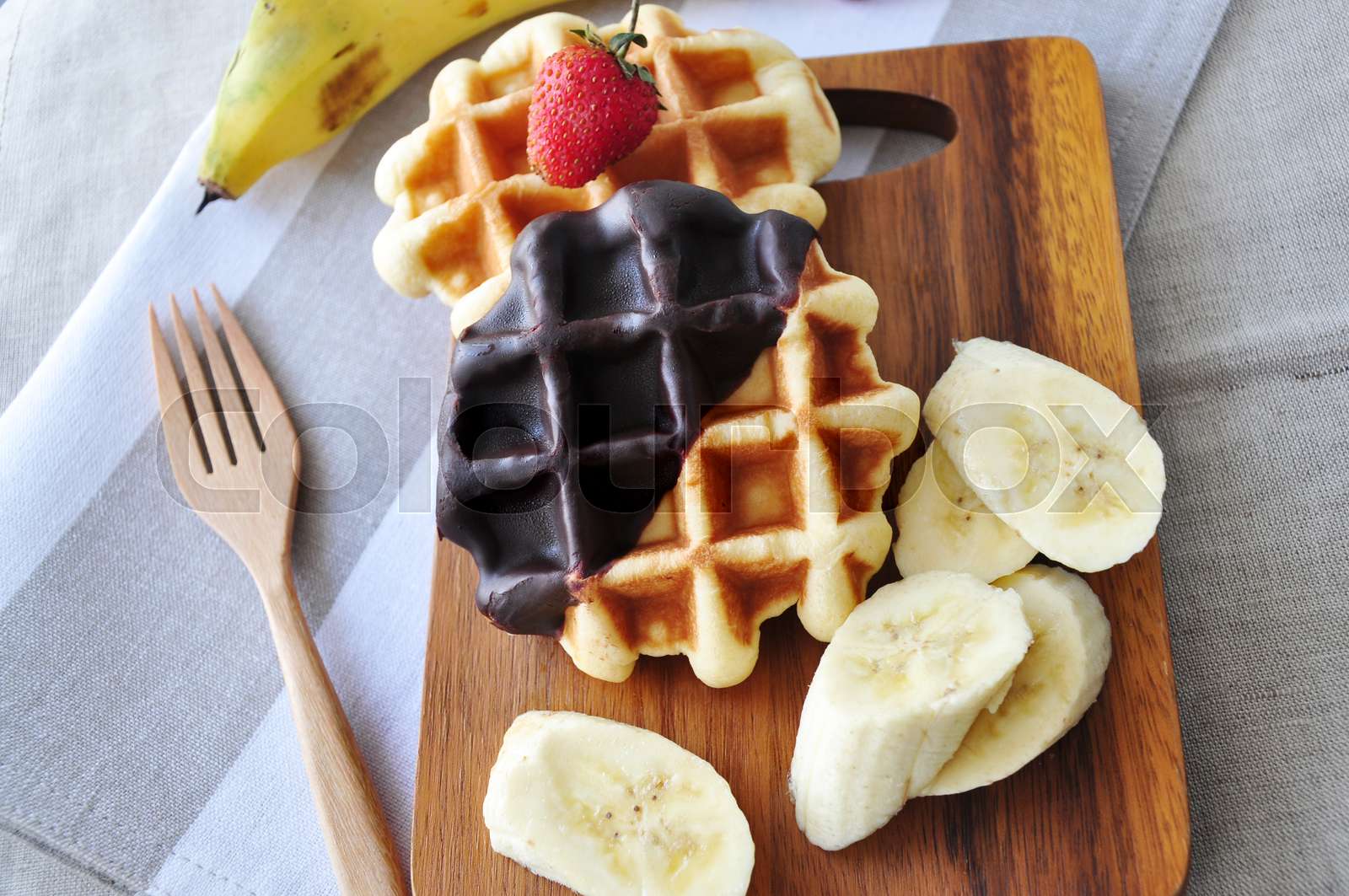 Close up Half Chocolate Waffles with Fresh Fruits Stock image Colourbox