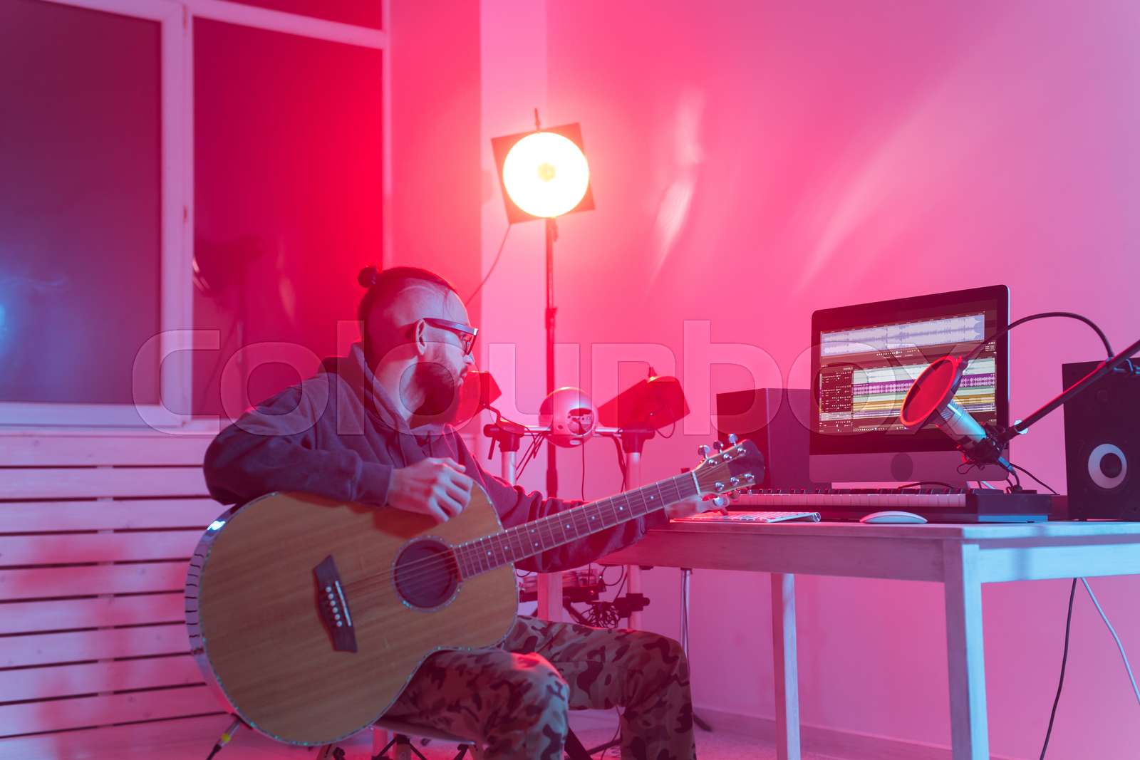 Musician and making music concept - Male sound producer working in