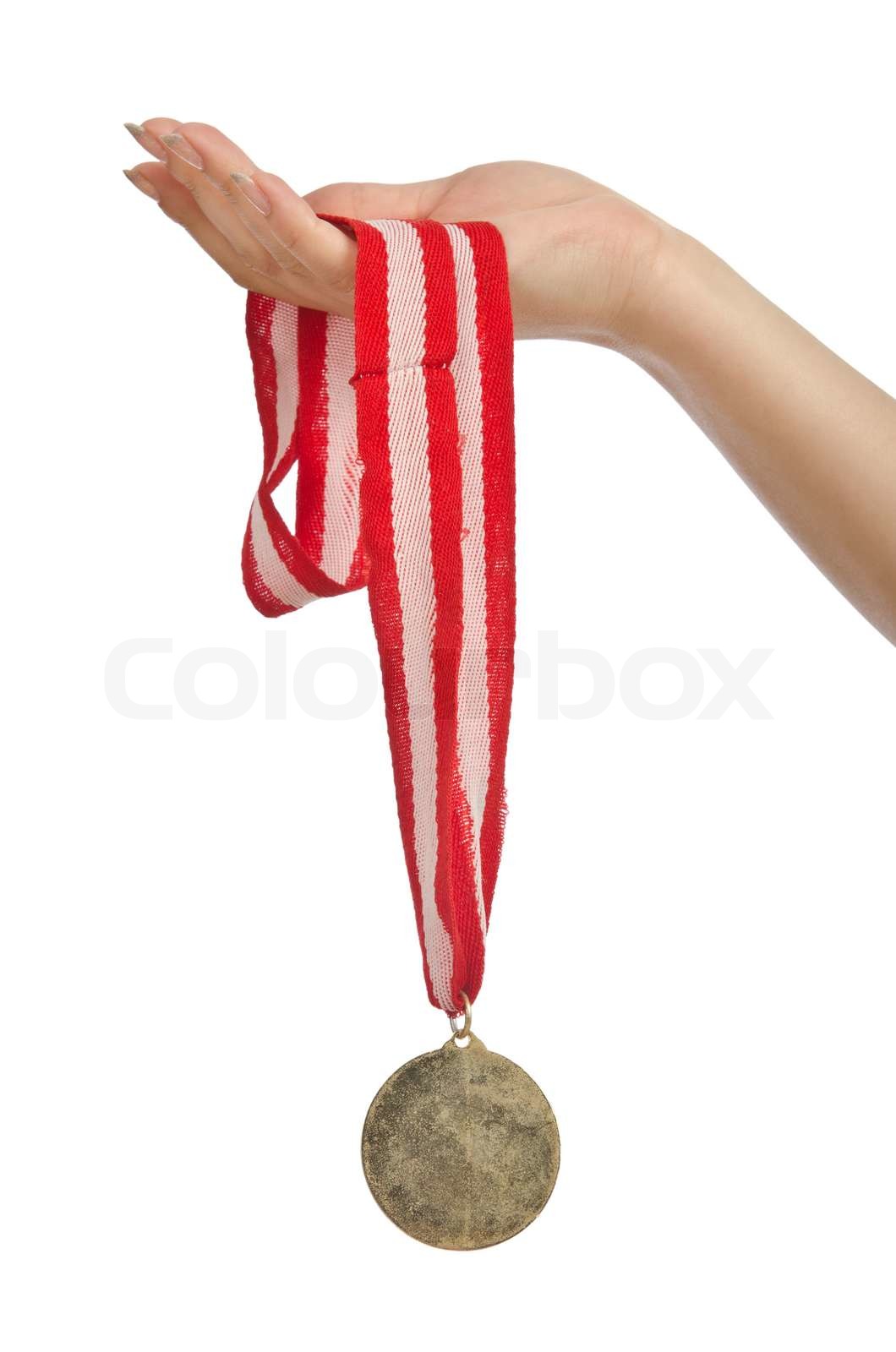 Hand, die Goldmedaille auf weiß Stock Bild Colourbox