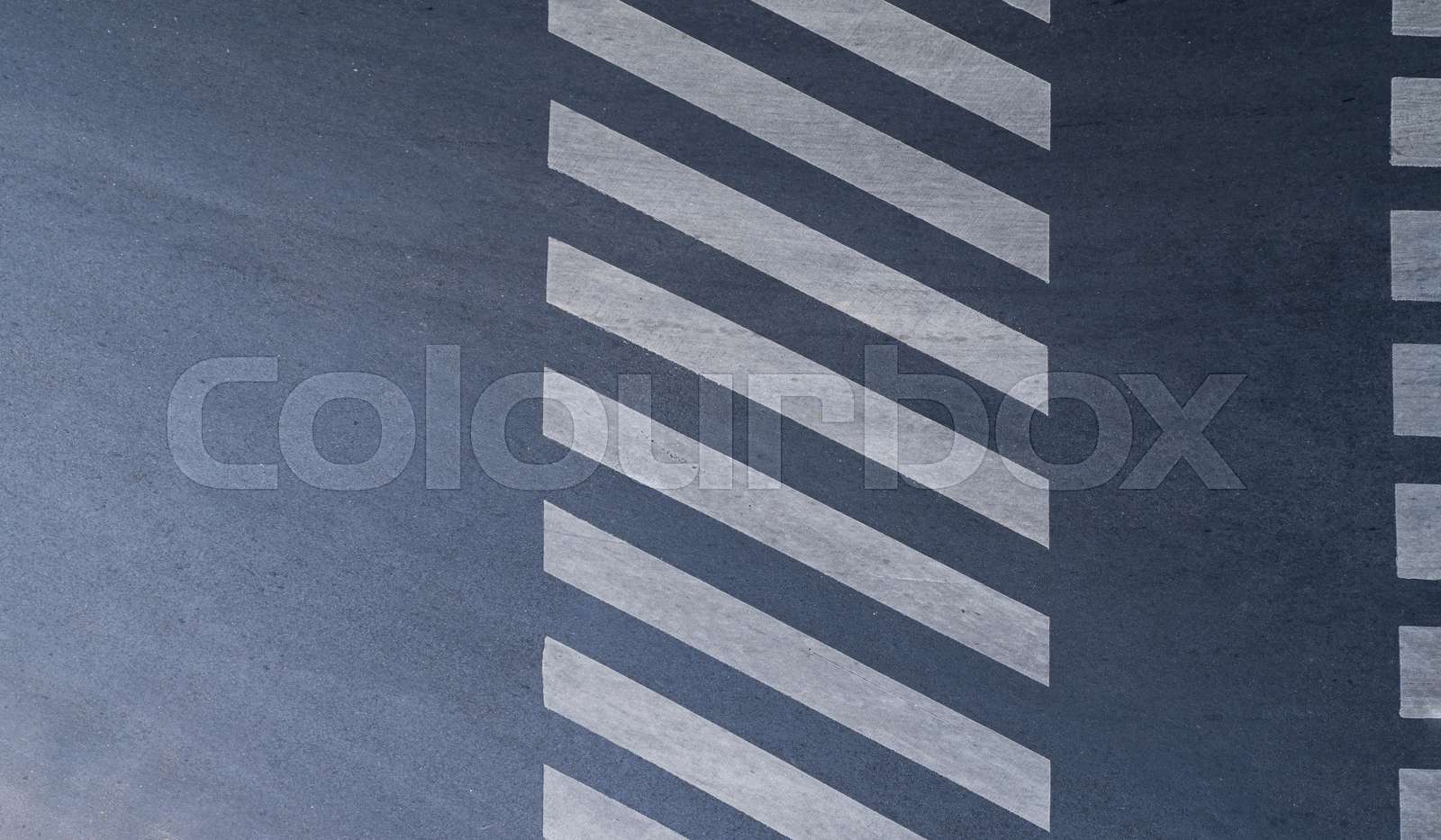 Aerial photo top view over pedestrian crossing on traffic road | Stock