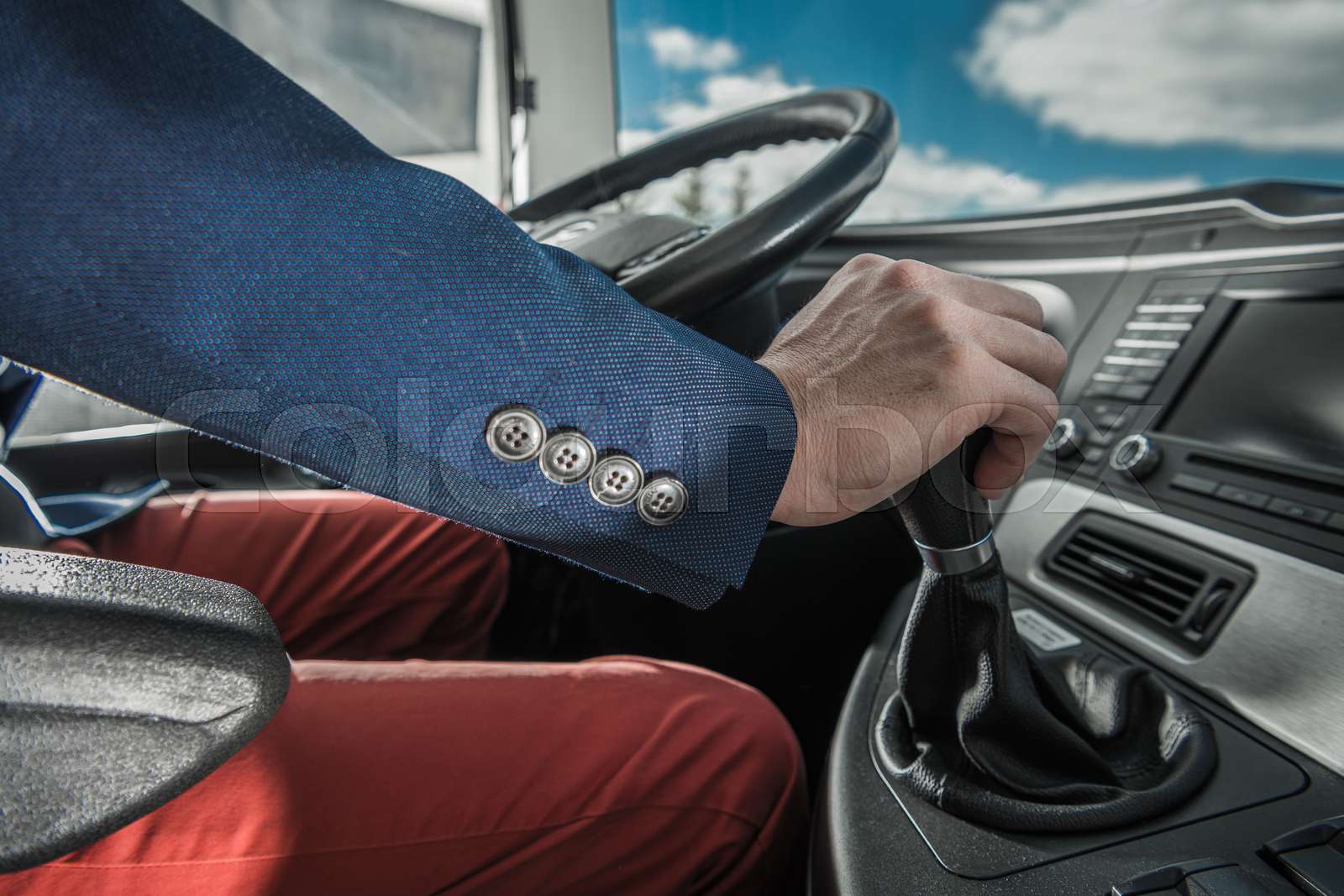 Bus Driver Behind Coach Steering Wheel | Stock image | Colourbox