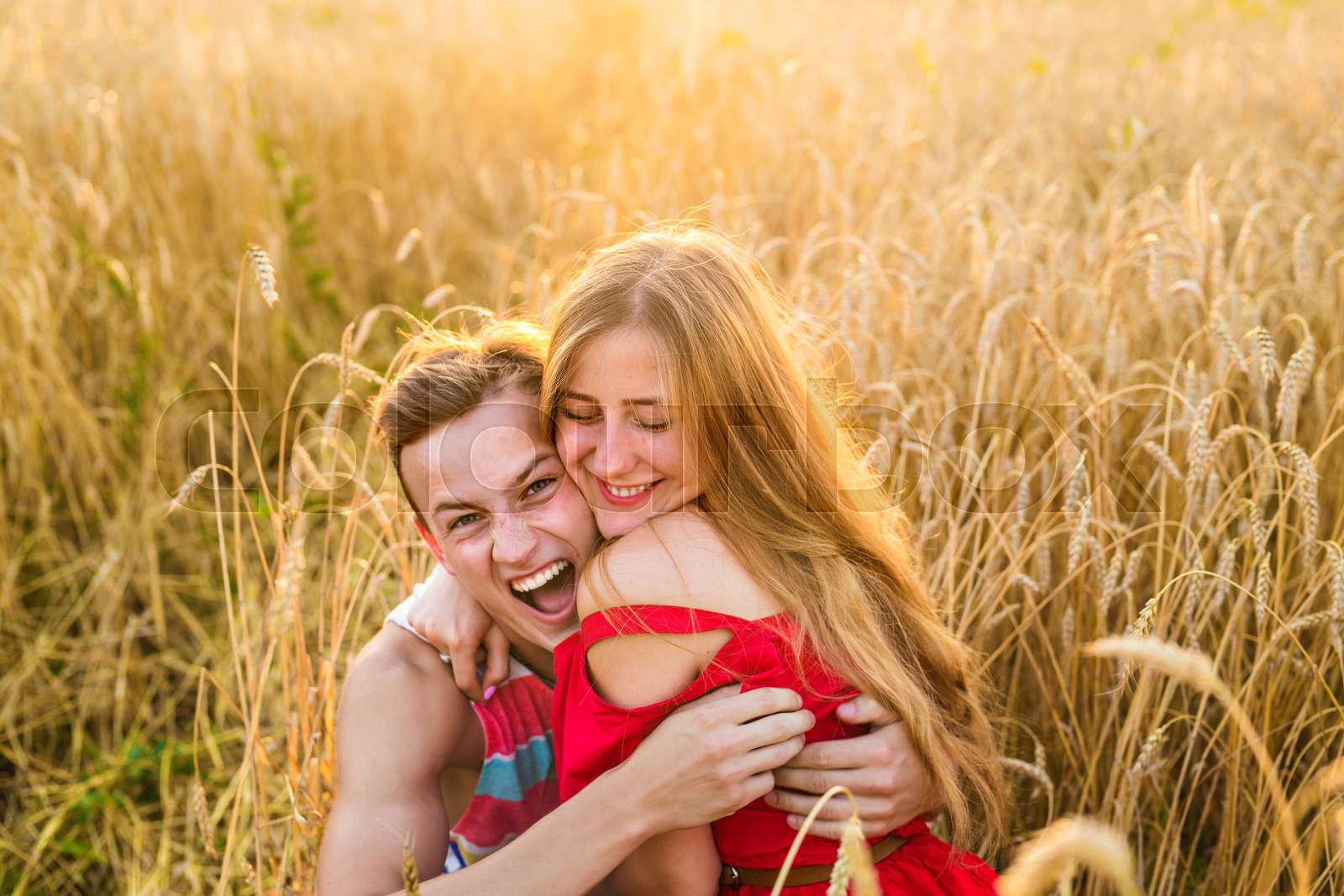 Teenage Girlfriend And Boyfriend Having Fun Outdoors Kissing Hugging teenage-girlfriend-and-boyfriend-having-fun-outdoors-kissing-hugging