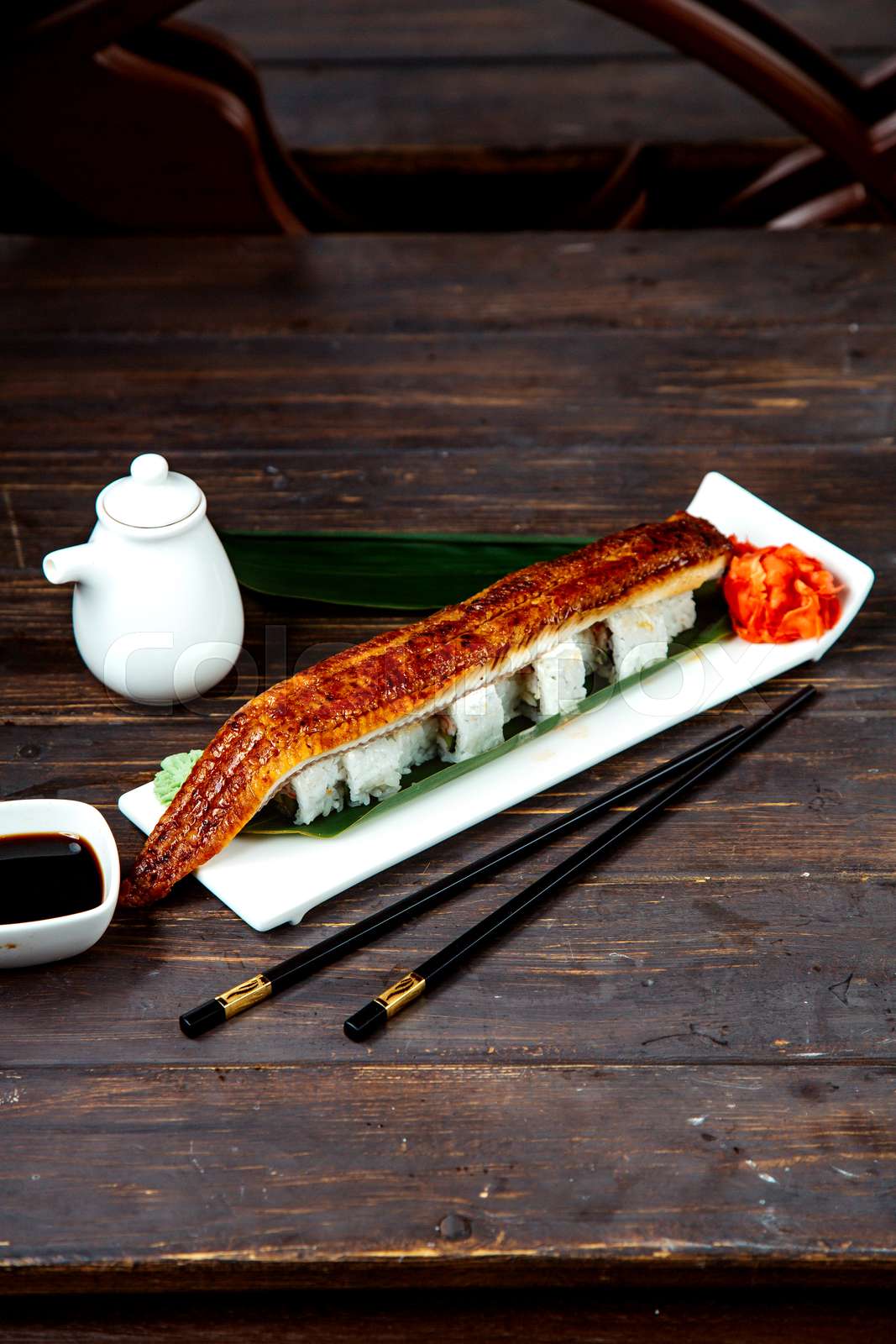 sushi rolls covered with fried fish fillet | Stock image | Colourbox