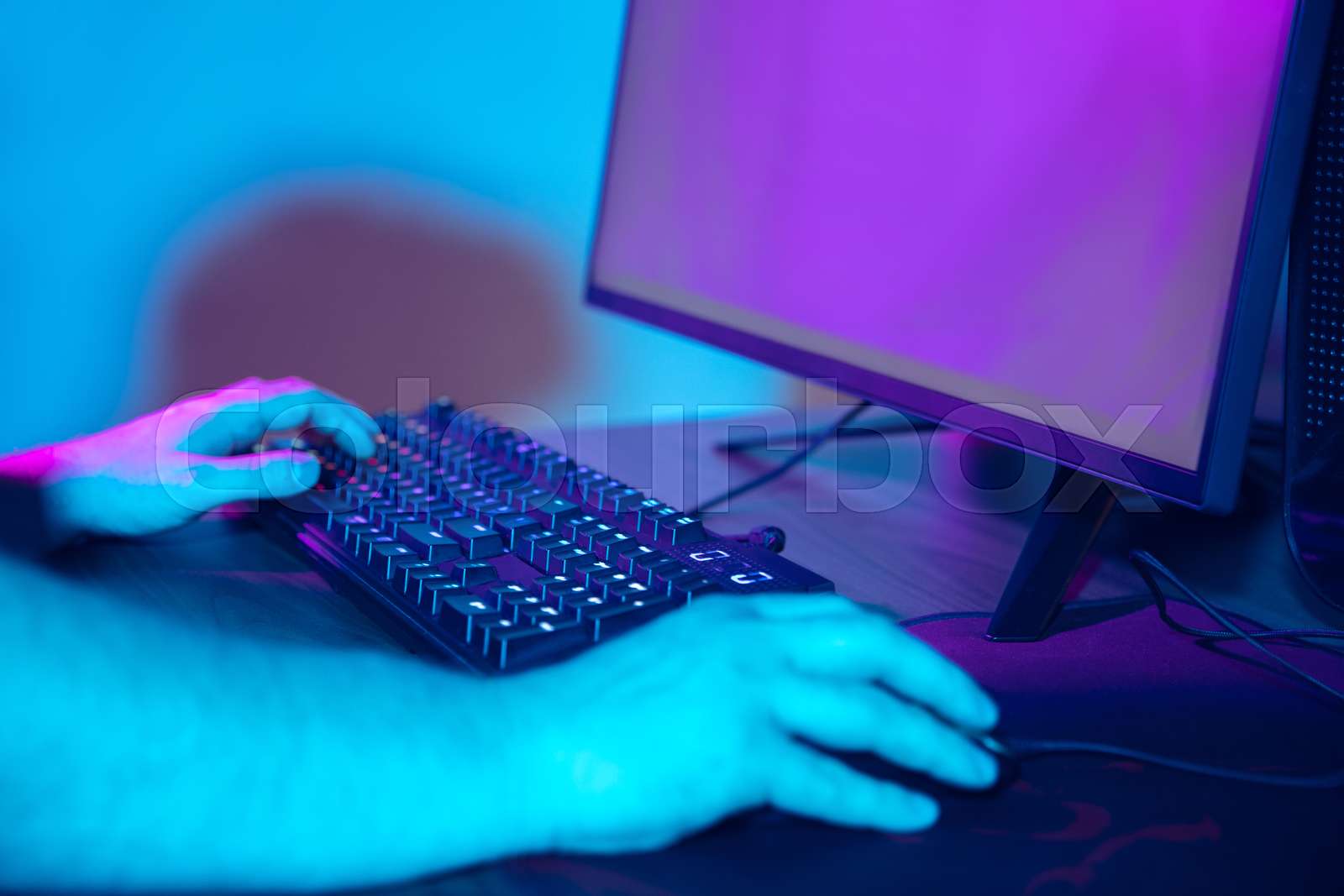 Cyber sport. Fully concentrated professional cybersport player playing ...
