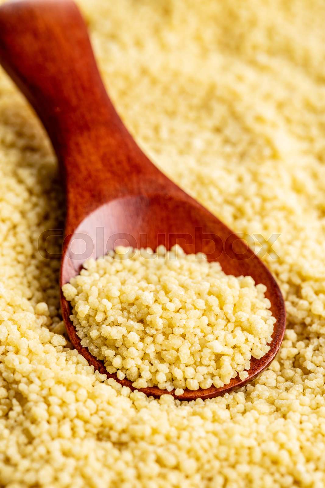 Dry yellow couscous | Stock image | Colourbox