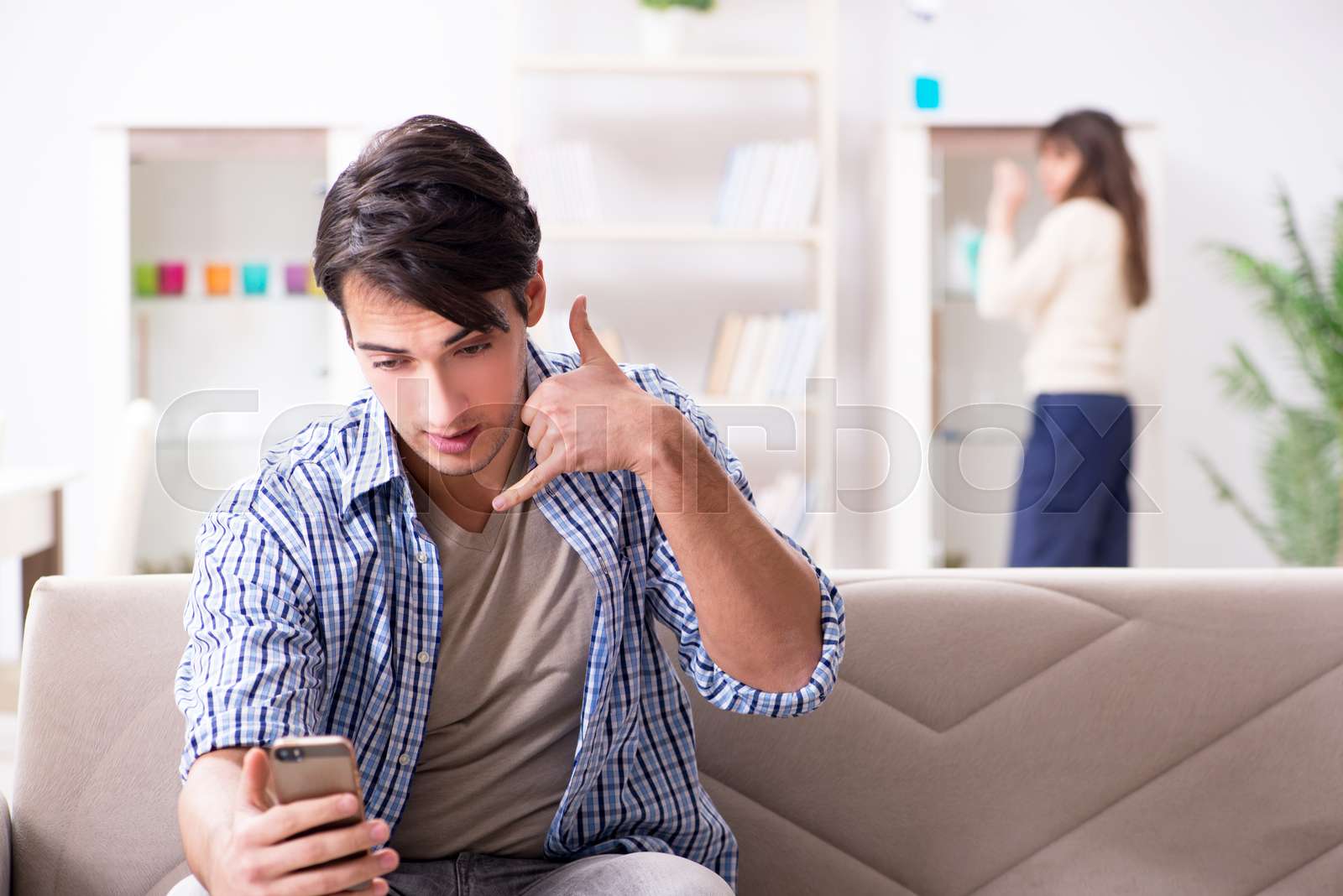 Couple cheating on each other at home | Stock image | Colourbox