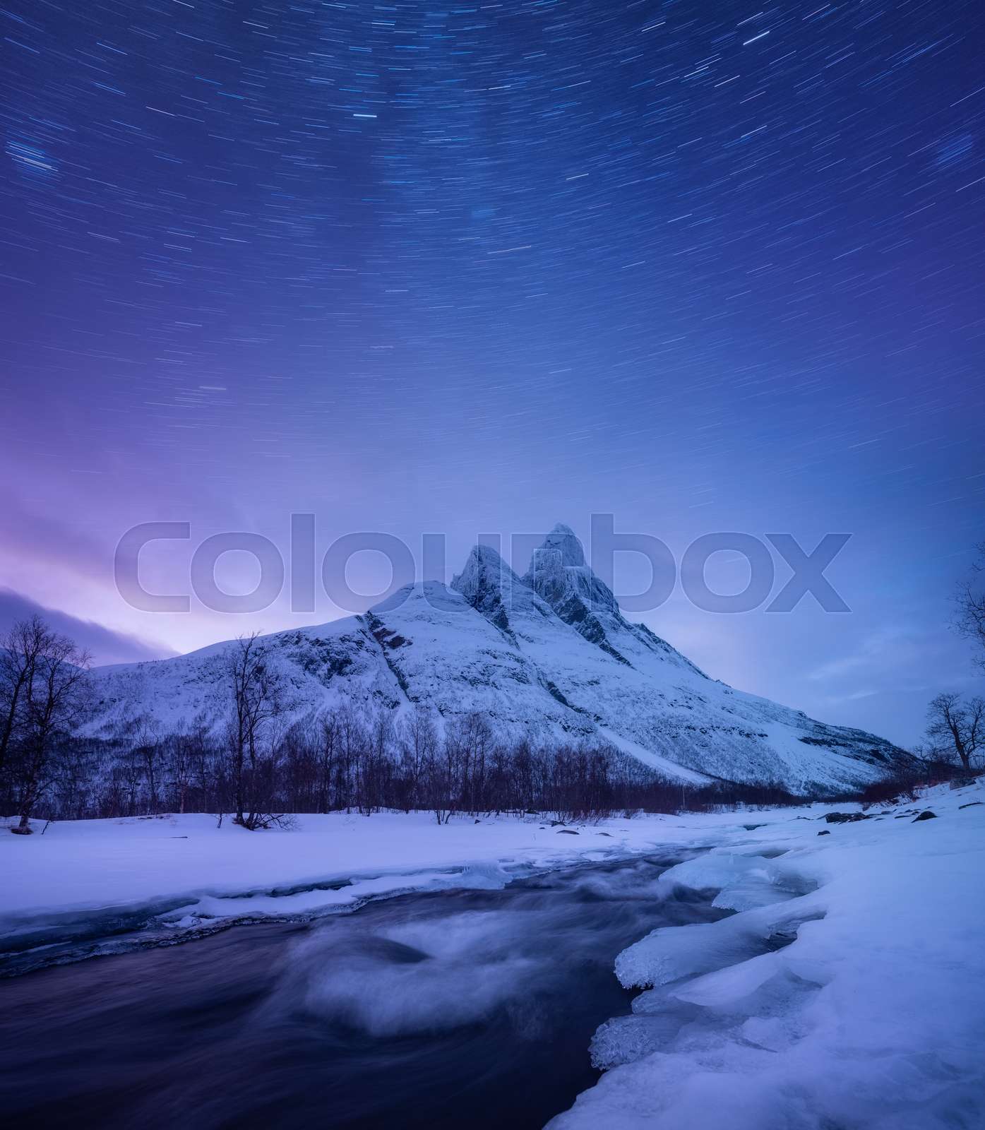 Mountains and starry night sky, Senja islands, Norway. Winter landscape ...