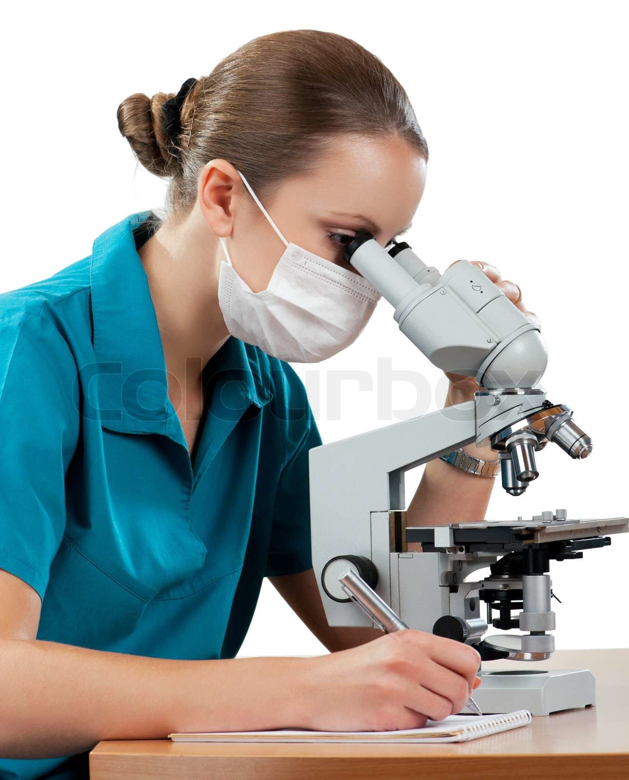 Doctor with microscope Stock image Colourbox