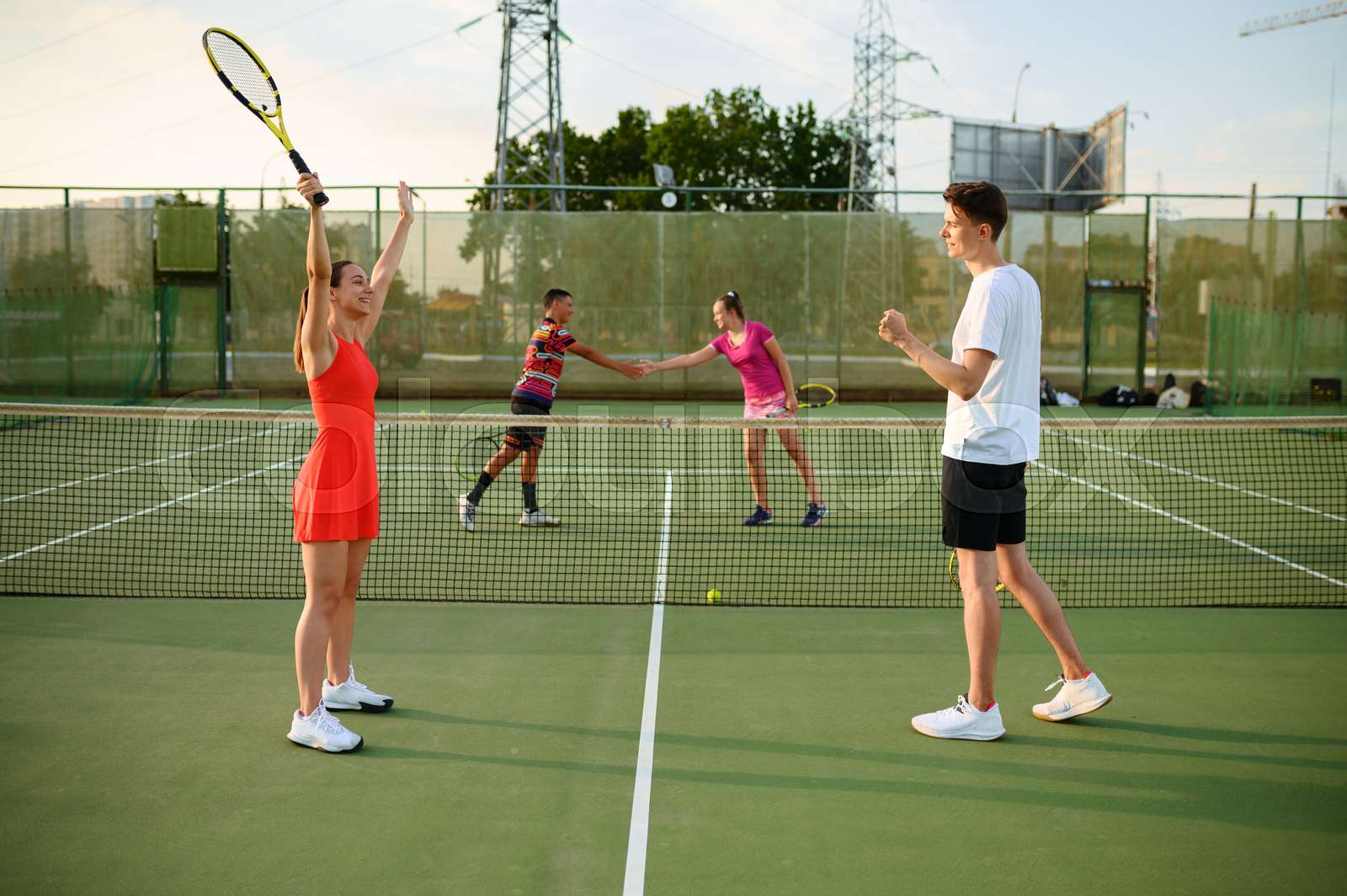 Mixed doubles tennis, players finished the game Stock image Colourbox