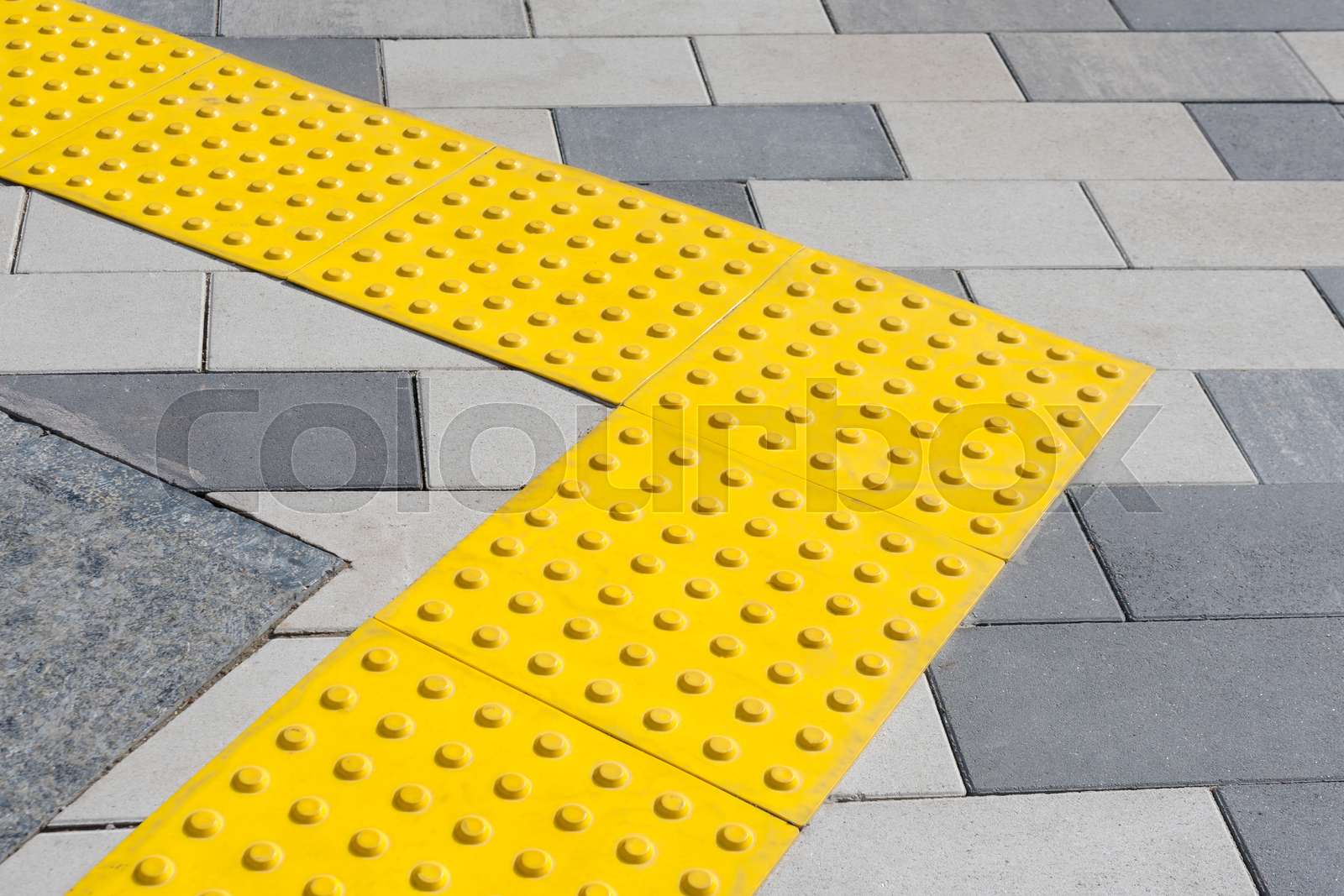 Yellow Blocks Of Tactile Paving For Blind Handicap Braille Blocks Yellow Blocks Of Tactile Paving For Blind Handicap Braille Blocks