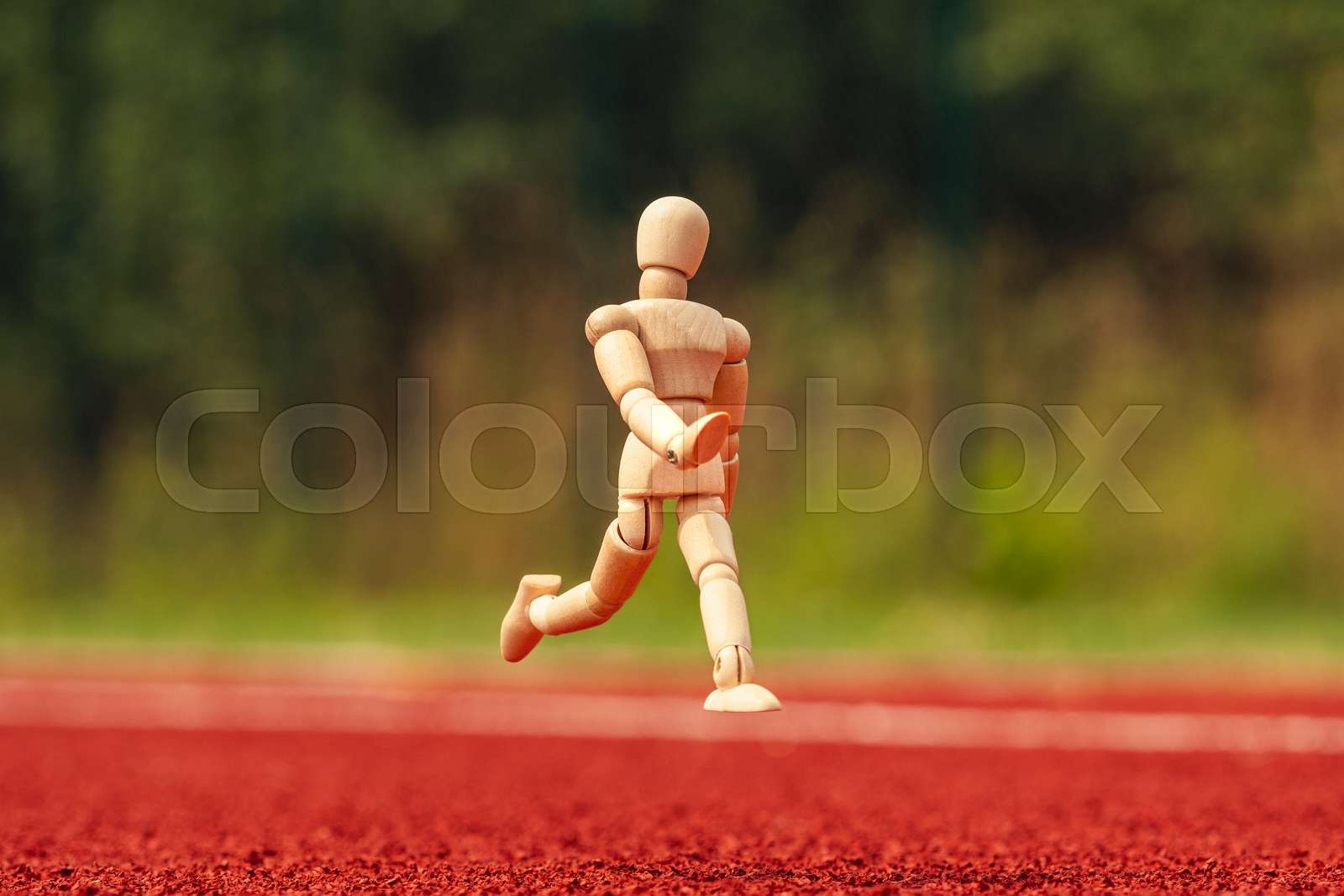 Dummy running on the stadium track Stock image Colourbox