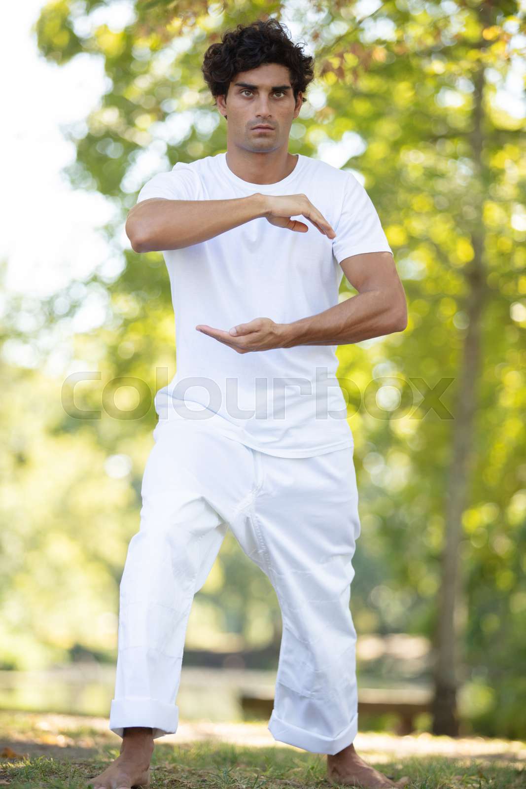 man doing yoga in nature | Stock image | Colourbox