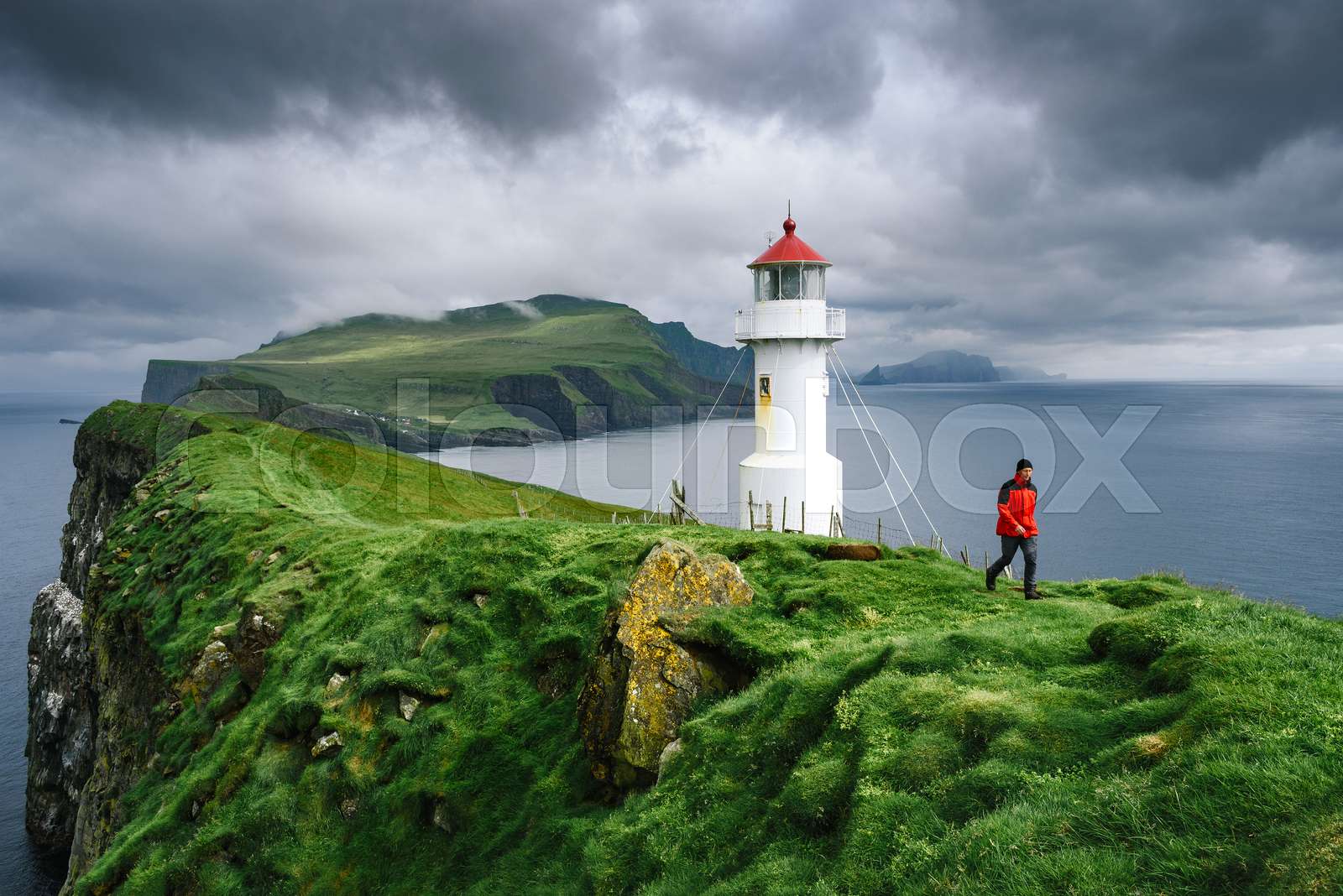 Hike To The Lighthouse On Mykines Faroe Islands Stock Image Colourbox hike-to-the-lighthouse-on-mykines-faroe-islands-stock-image-colourbox