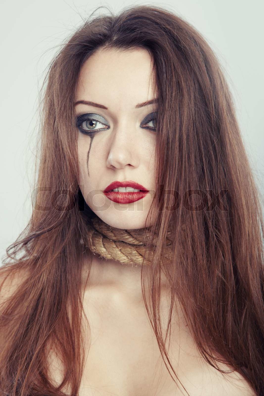 Premium Photo | Portrait of a sad young woman sitting on the floor