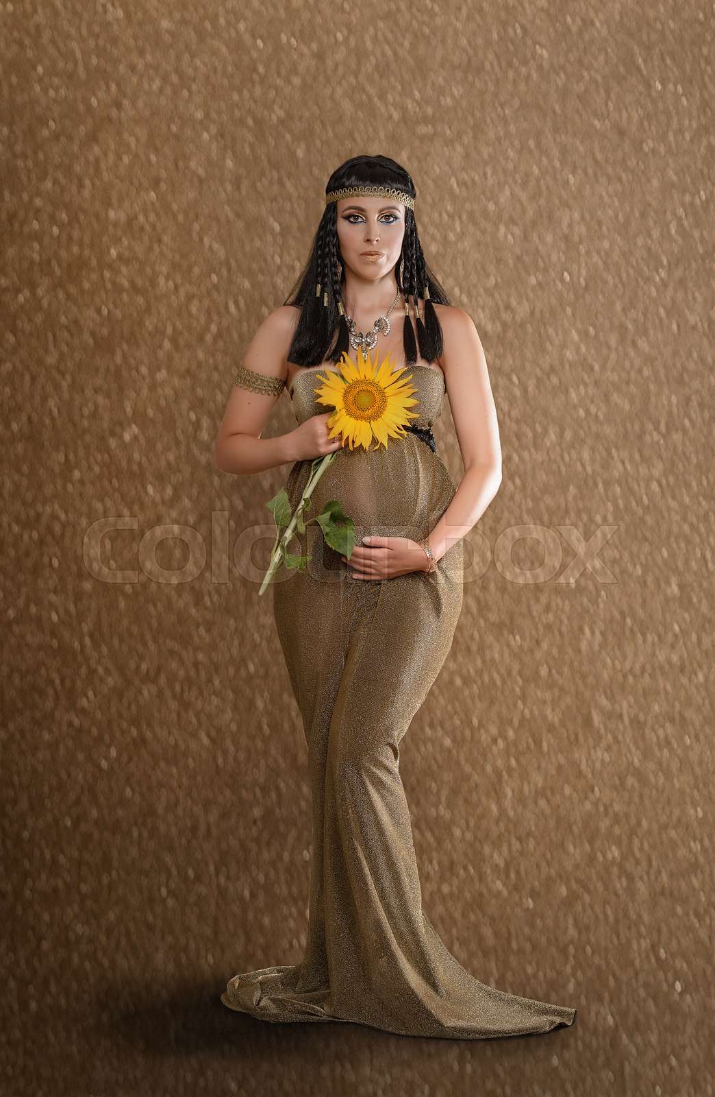 Pregnant woman dressed as Cleopatra | Stock image | Colourbox