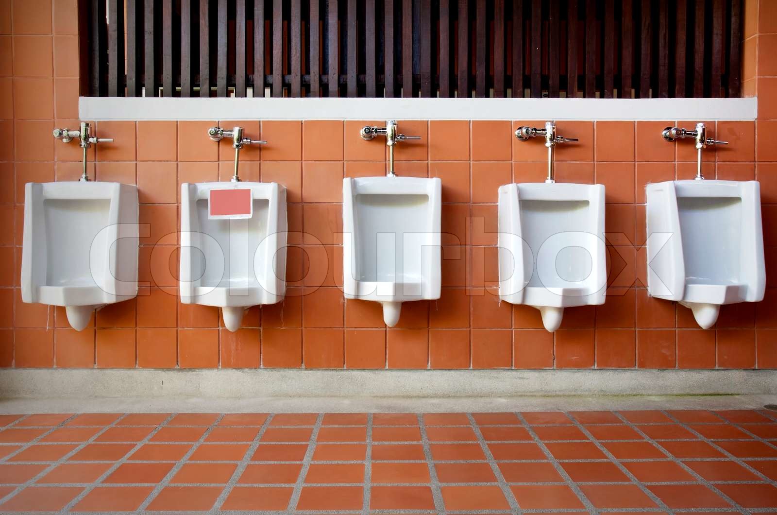 men urinal Stock image Colourbox