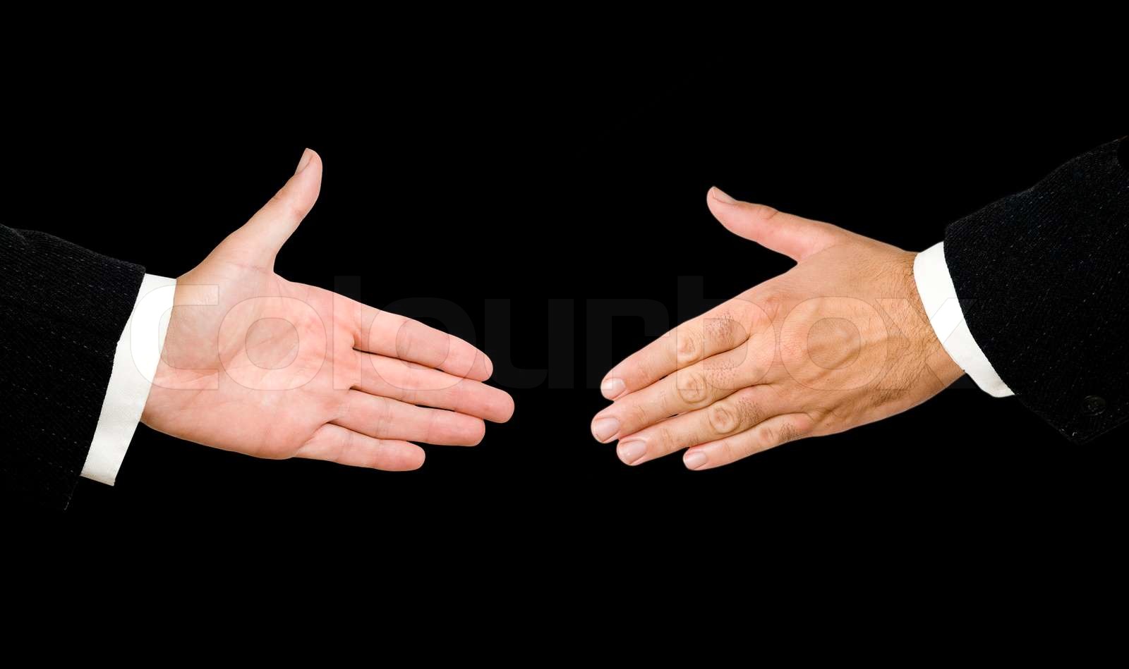 Hands ready for handshaking Stock image Colourbox