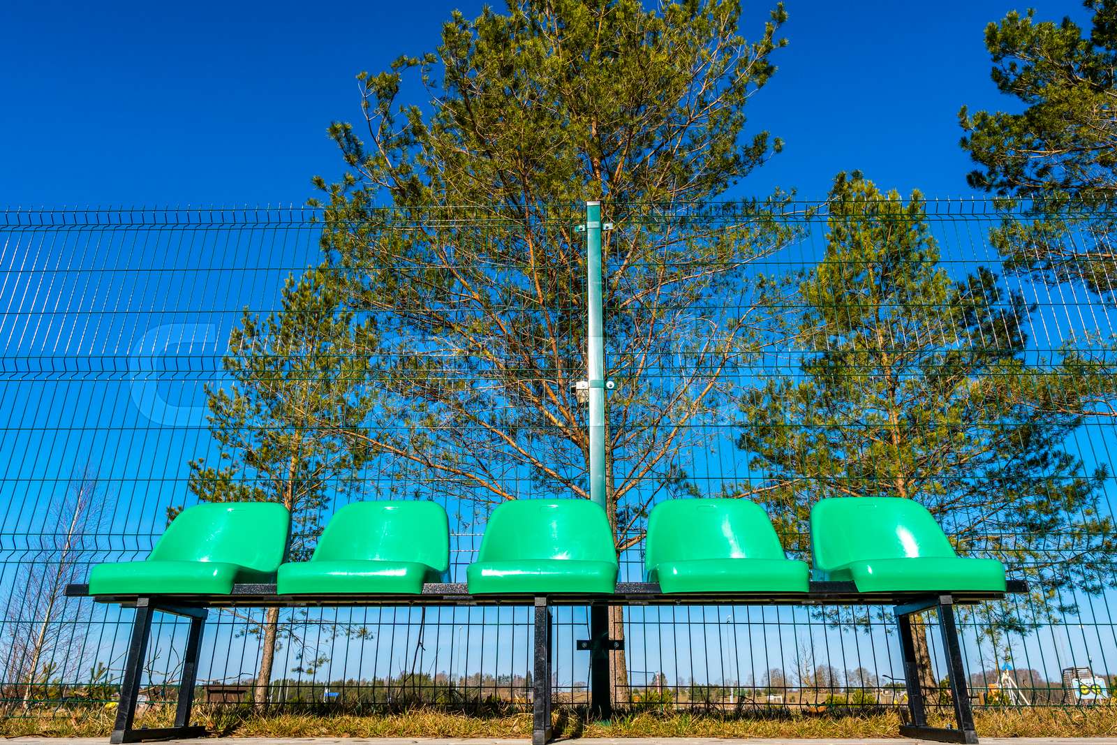 Plastic chairs in the basketball court from a low angle Stock image