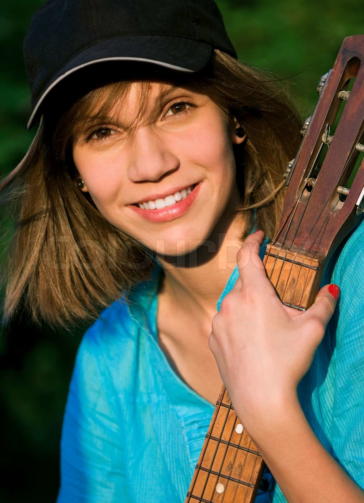 Teenage pige med guitar stock foto colourbox