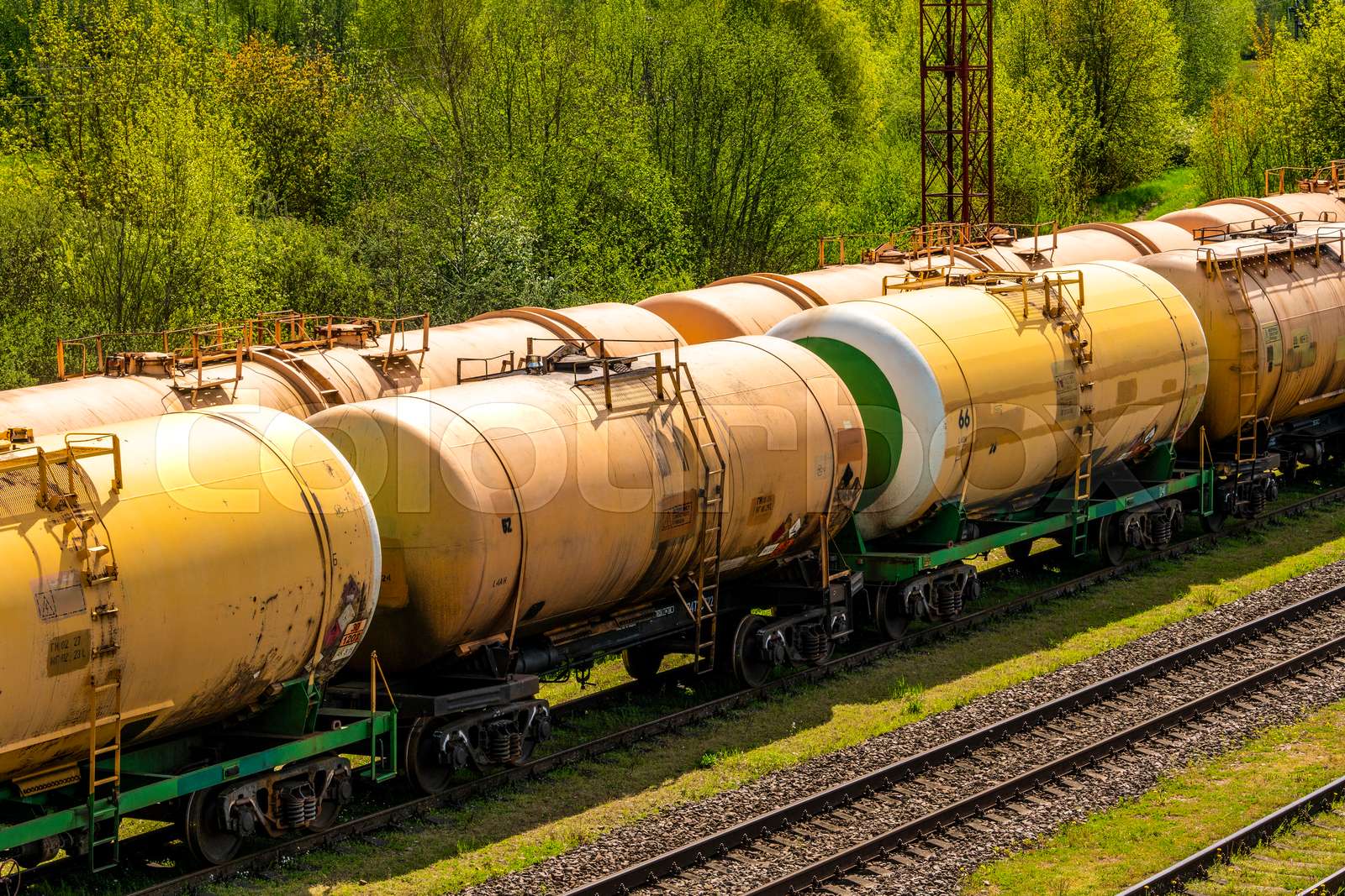 Freight trains transporting liquid fuel at depot Stock image Colourbox