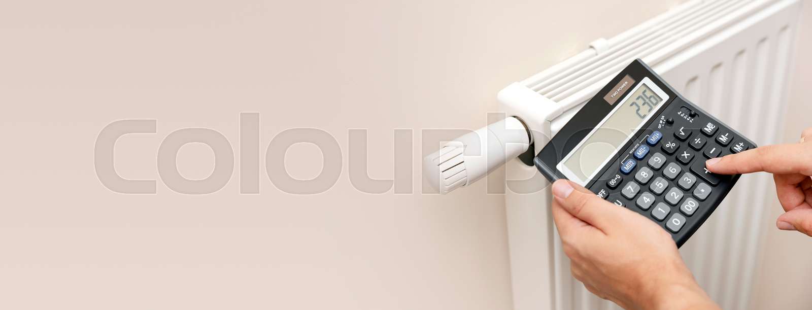 Radiator, expensive heating cost Stock image Colourbox