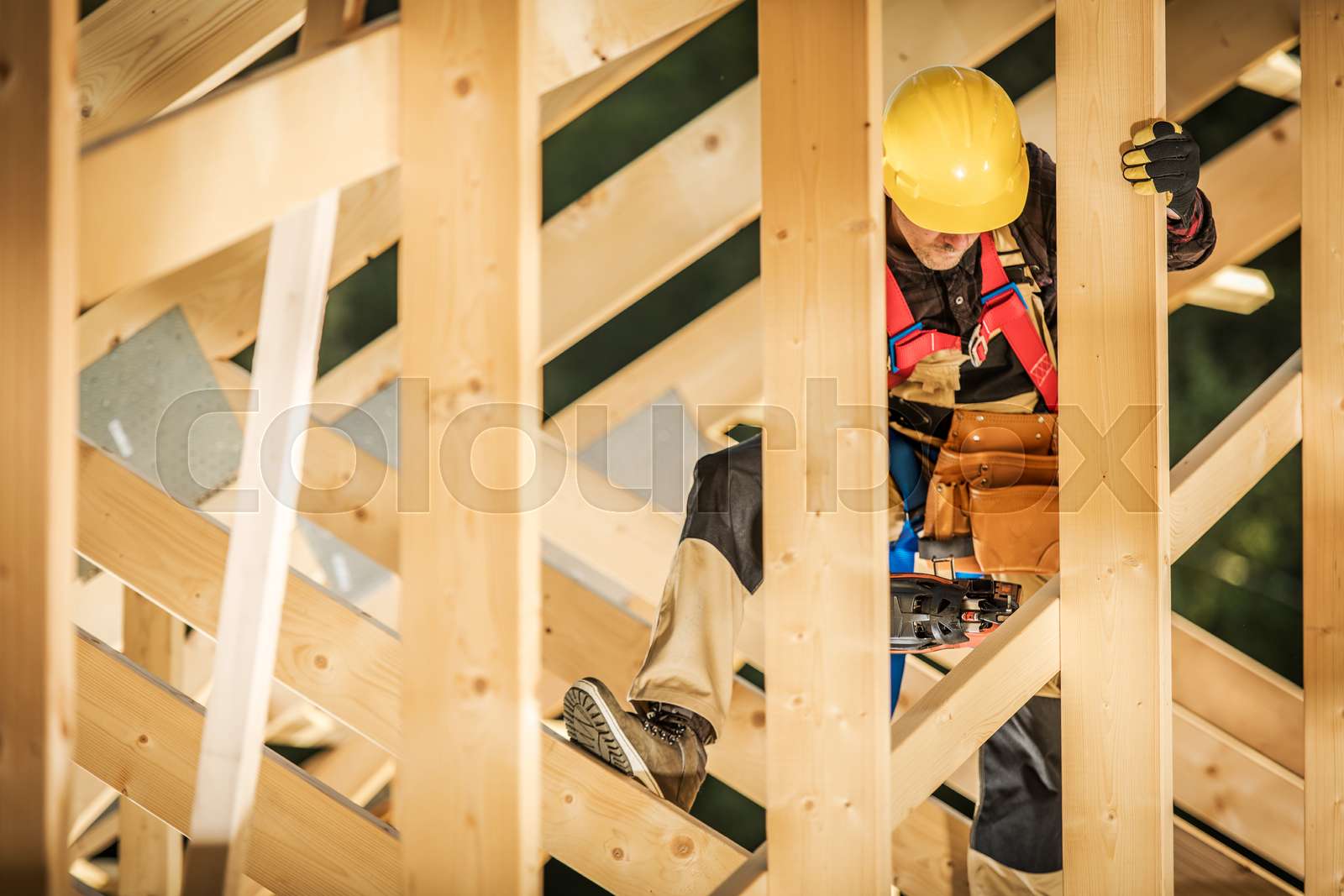 Man working at height at the construction site stock image colourbox