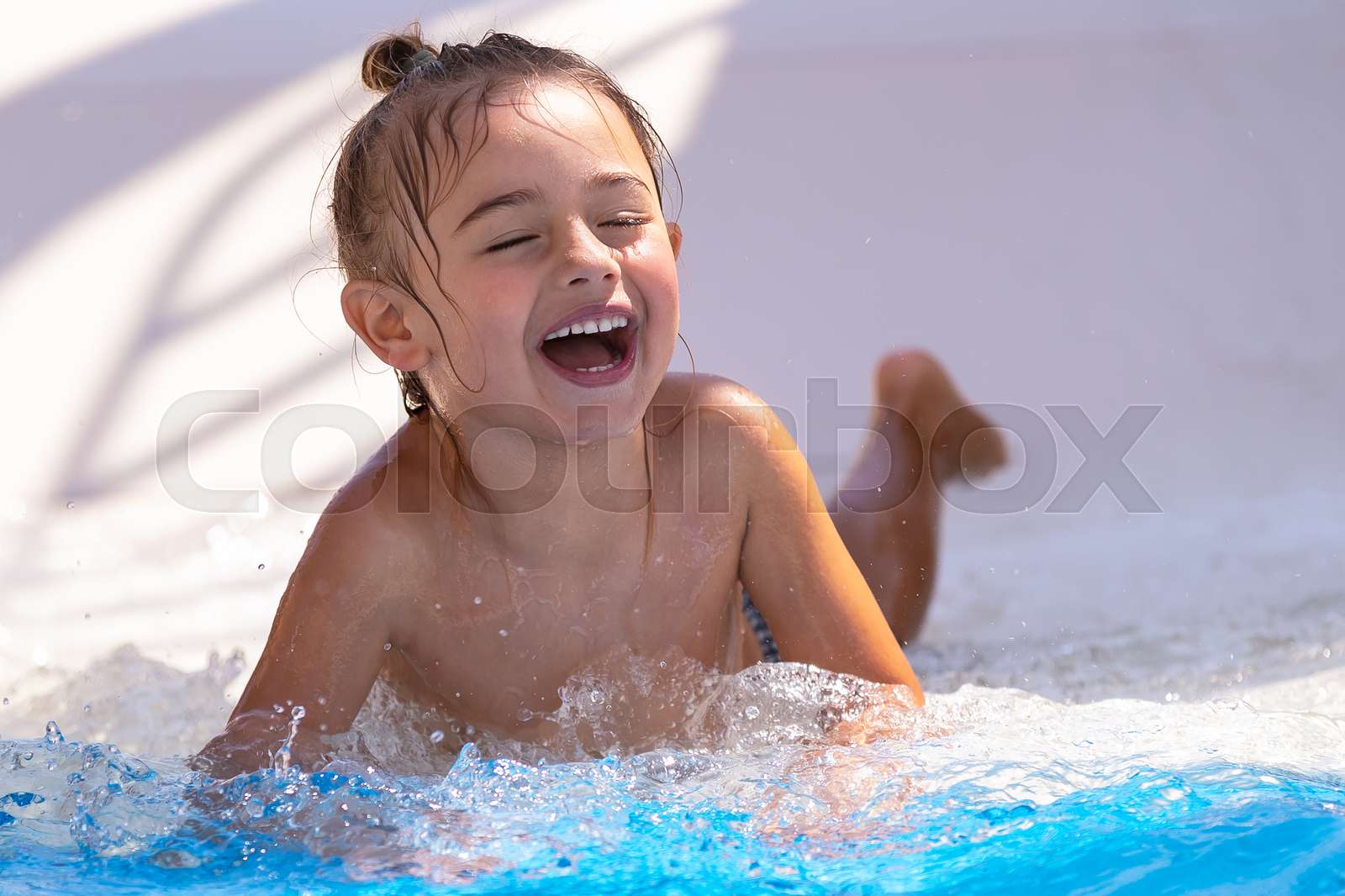 Happy Child In The Pool Stock Image Colourbox happy-child-in-the-pool-stock-image-colourbox
