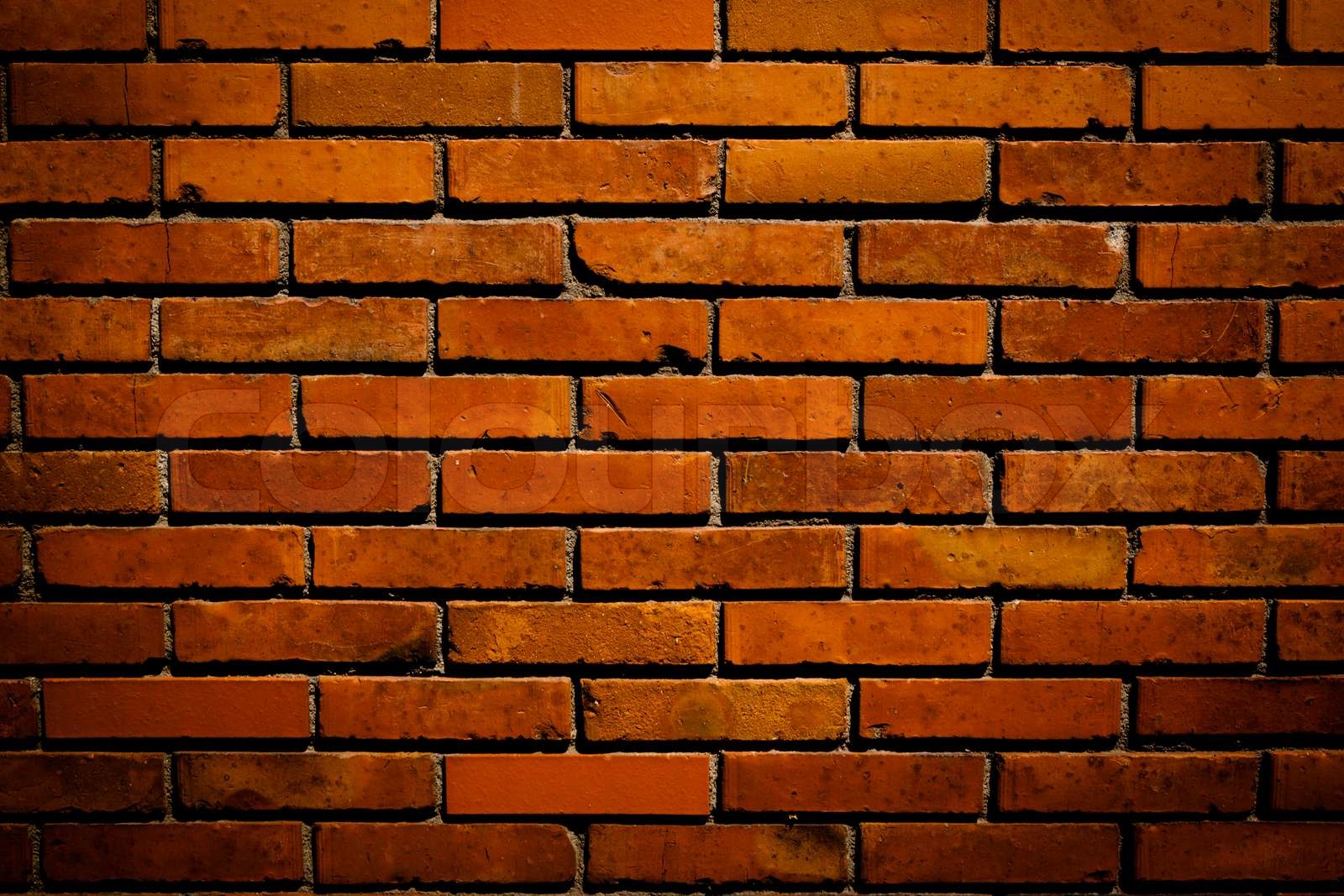 Dark red brick wall | Stock image | Colourbox
