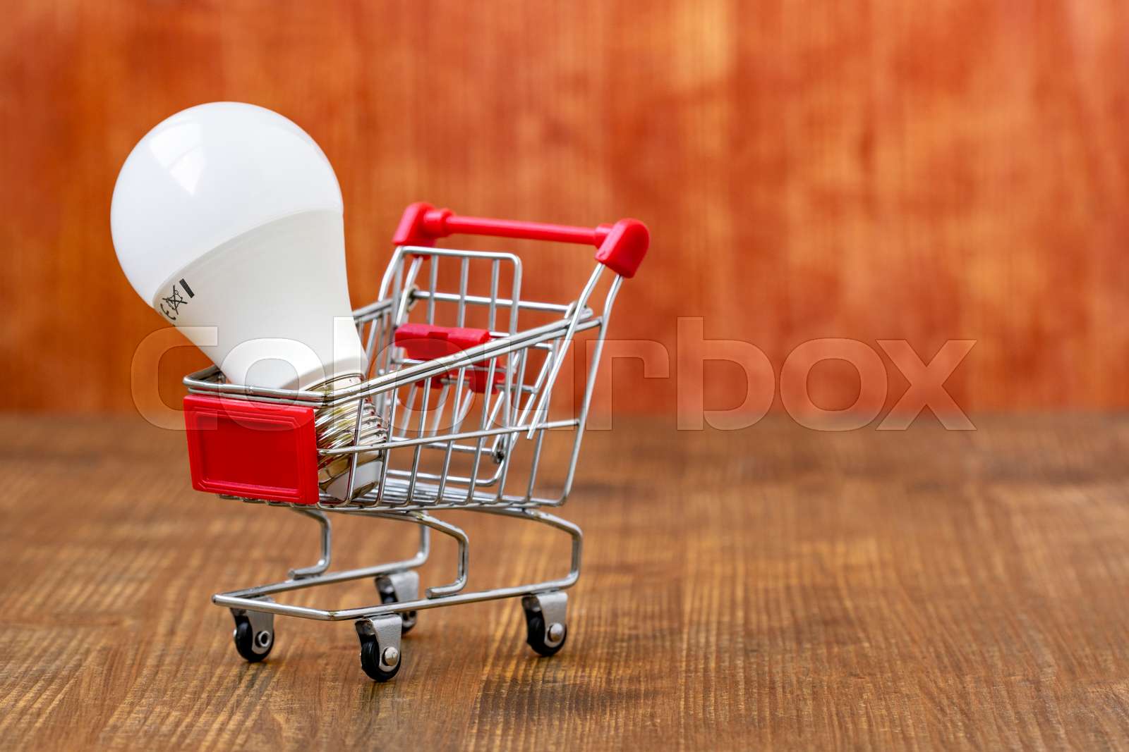 White Light Bulb In Small Shopping Trolley Stock Image Colourbox white-light-bulb-in-small-shopping-trolley-stock-image-colourbox
